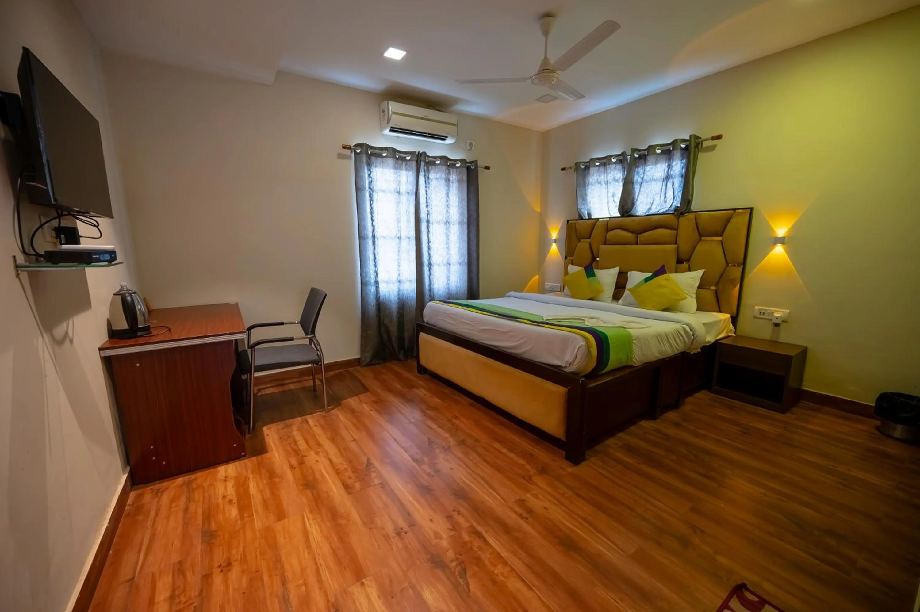 Bed in HOTEL MITTAL GARDEN