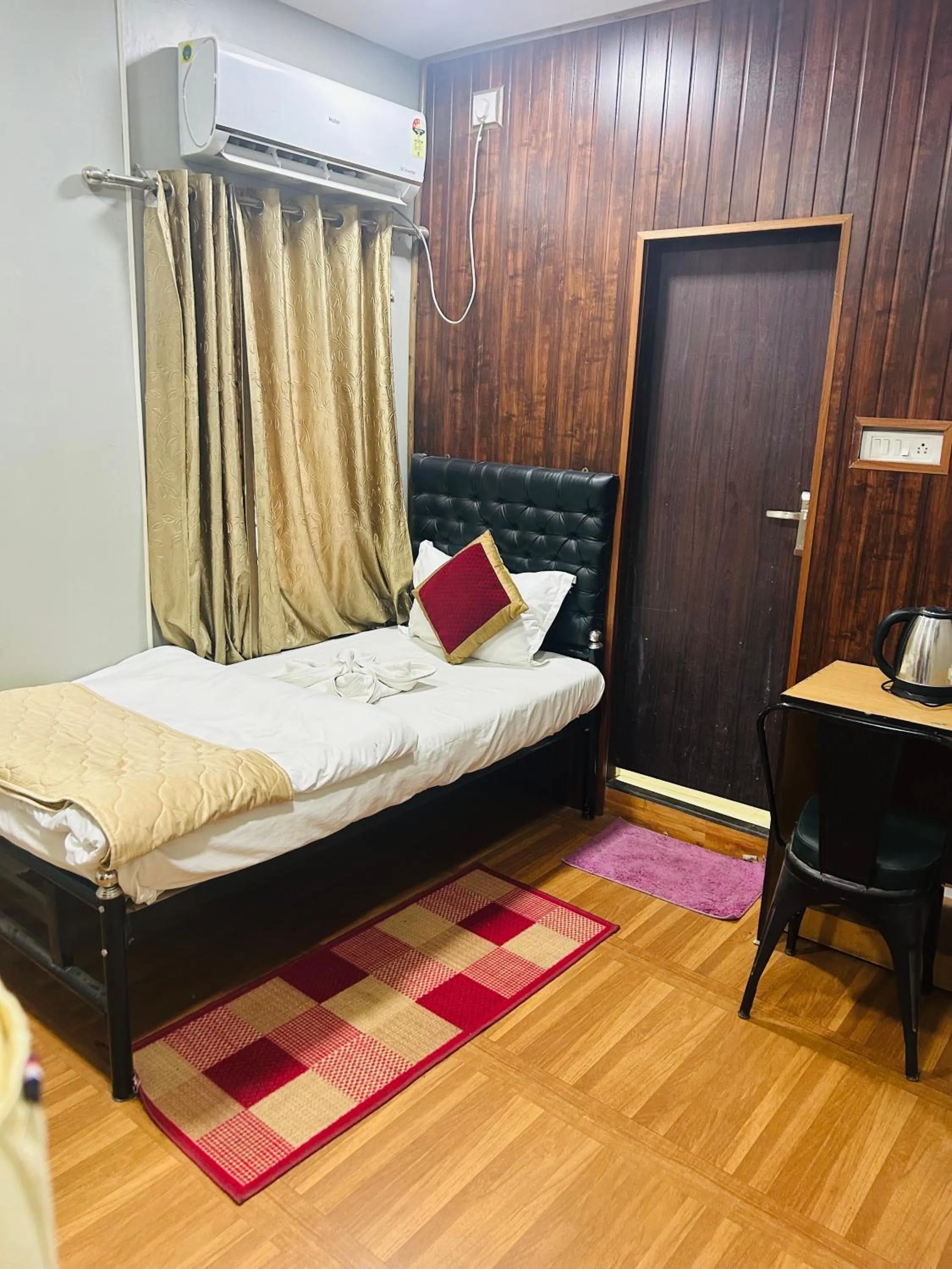 Bed in HOTEL MITTAL GARDEN