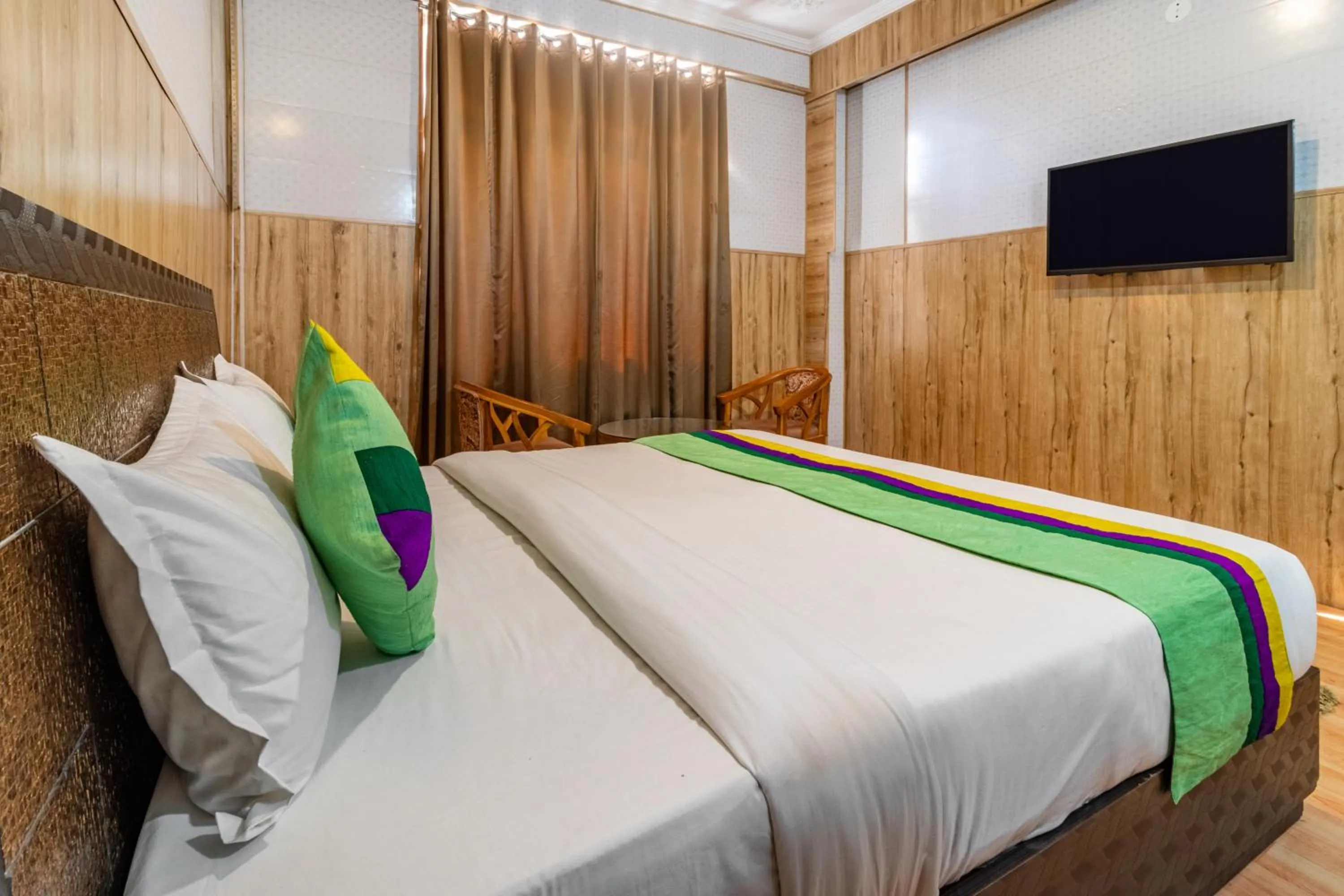 Bedroom in Treebo Srishti Vaikunth With Mountain View