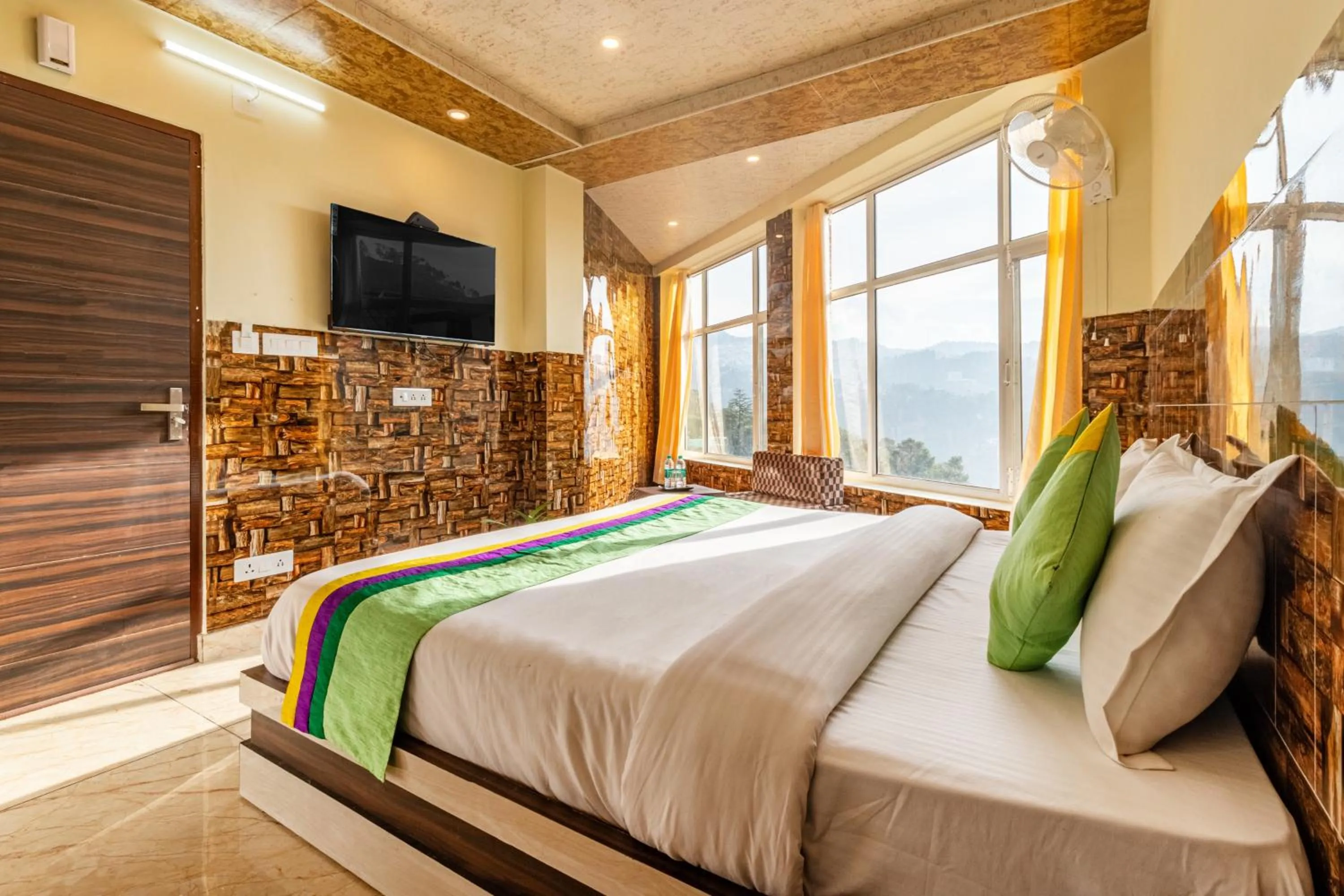 Bedroom in Treebo Srishti Vaikunth With Mountain View