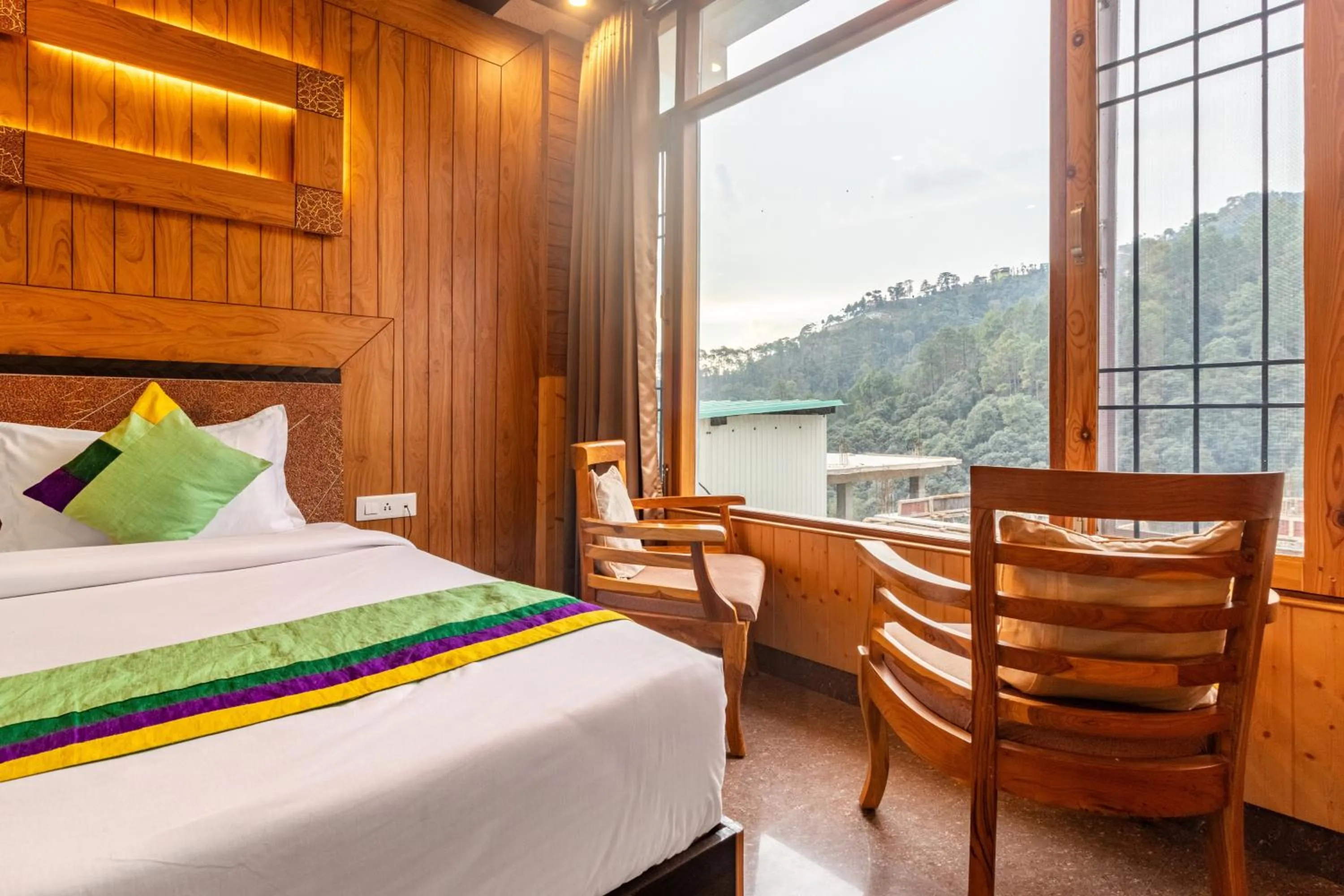 Bedroom in Treebo Srishti Vaikunth With Mountain View