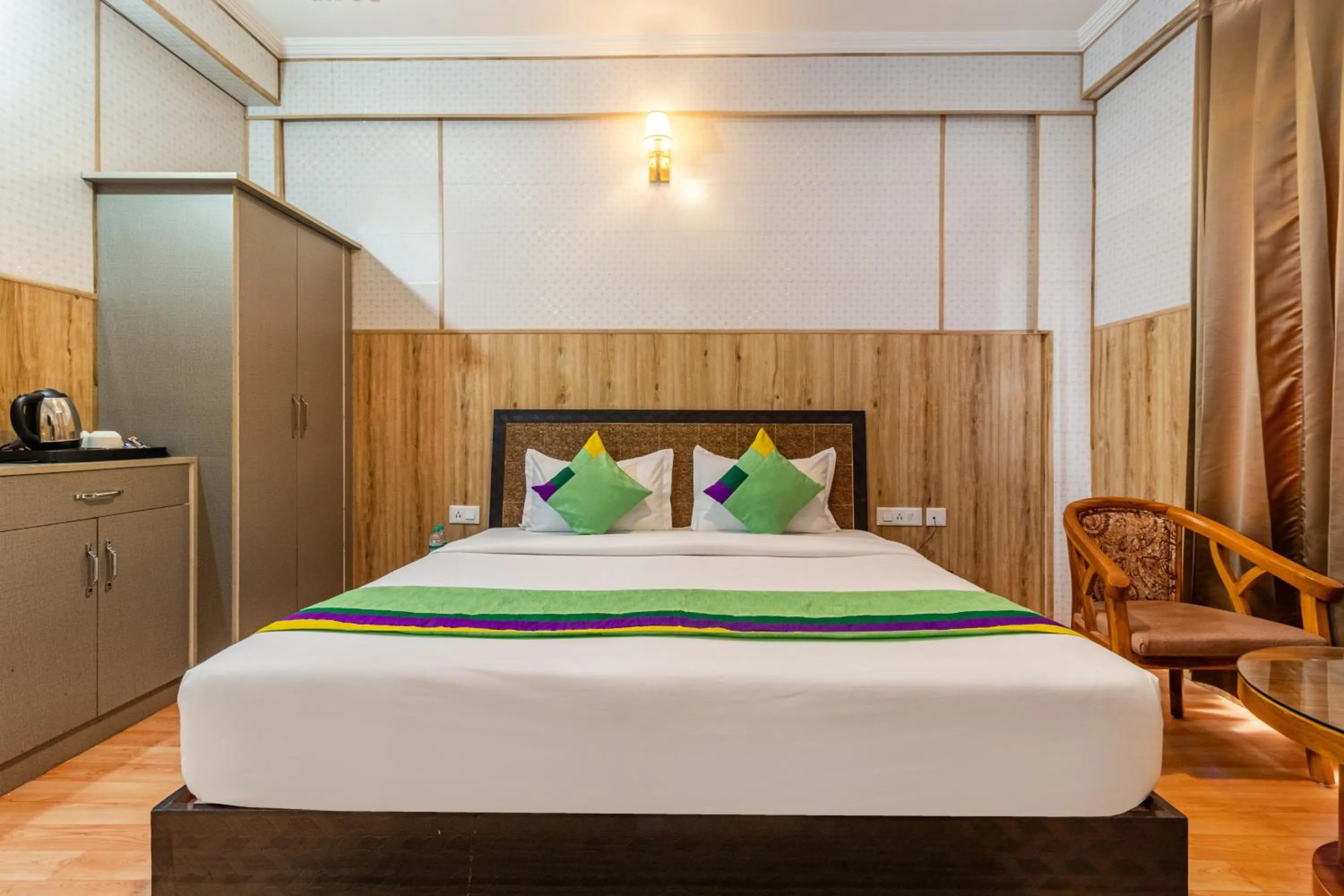 Bedroom in Treebo Srishti Vaikunth With Mountain View