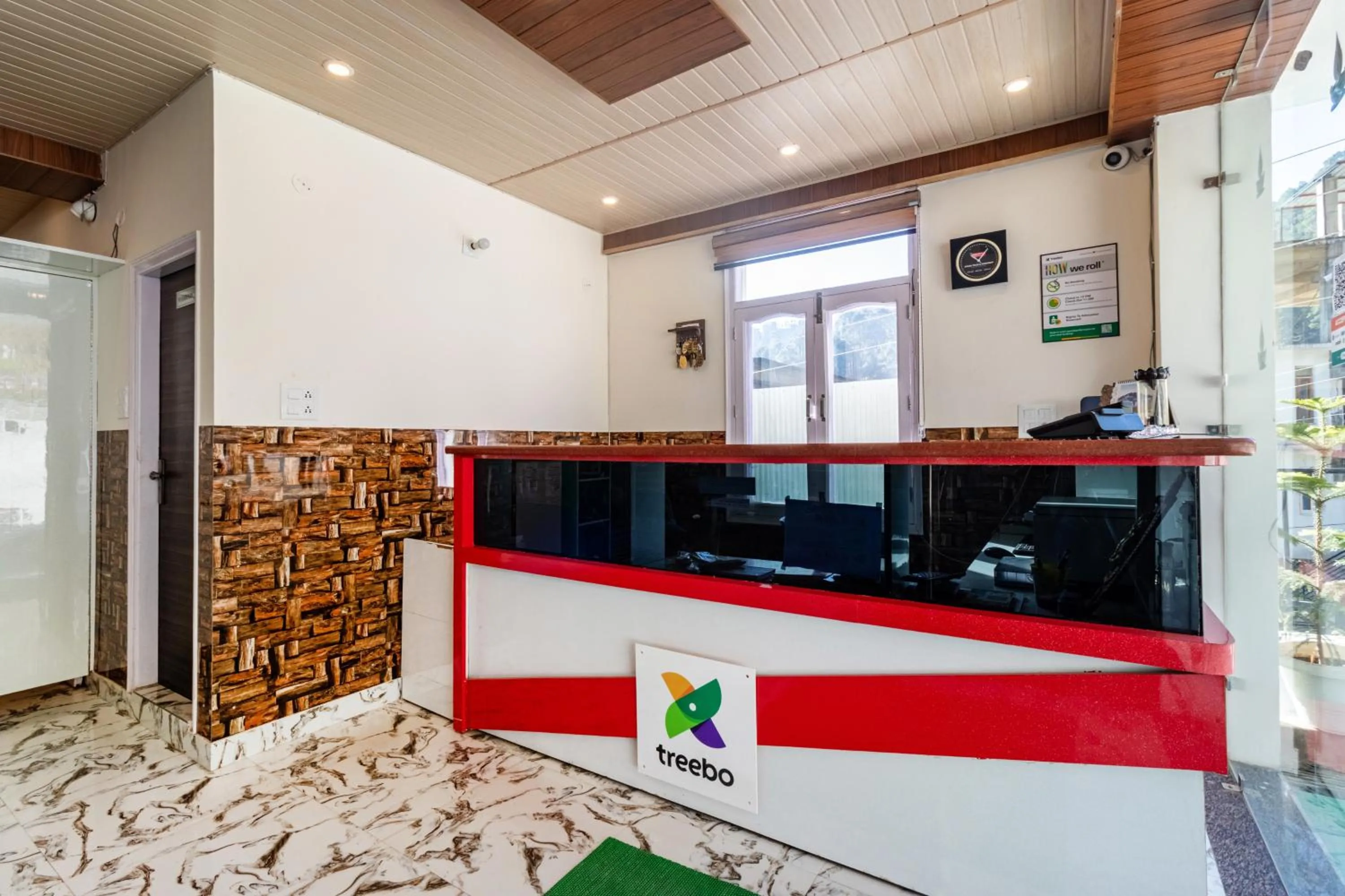 Lobby or reception in Treebo Srishti Vaikunth With Mountain View