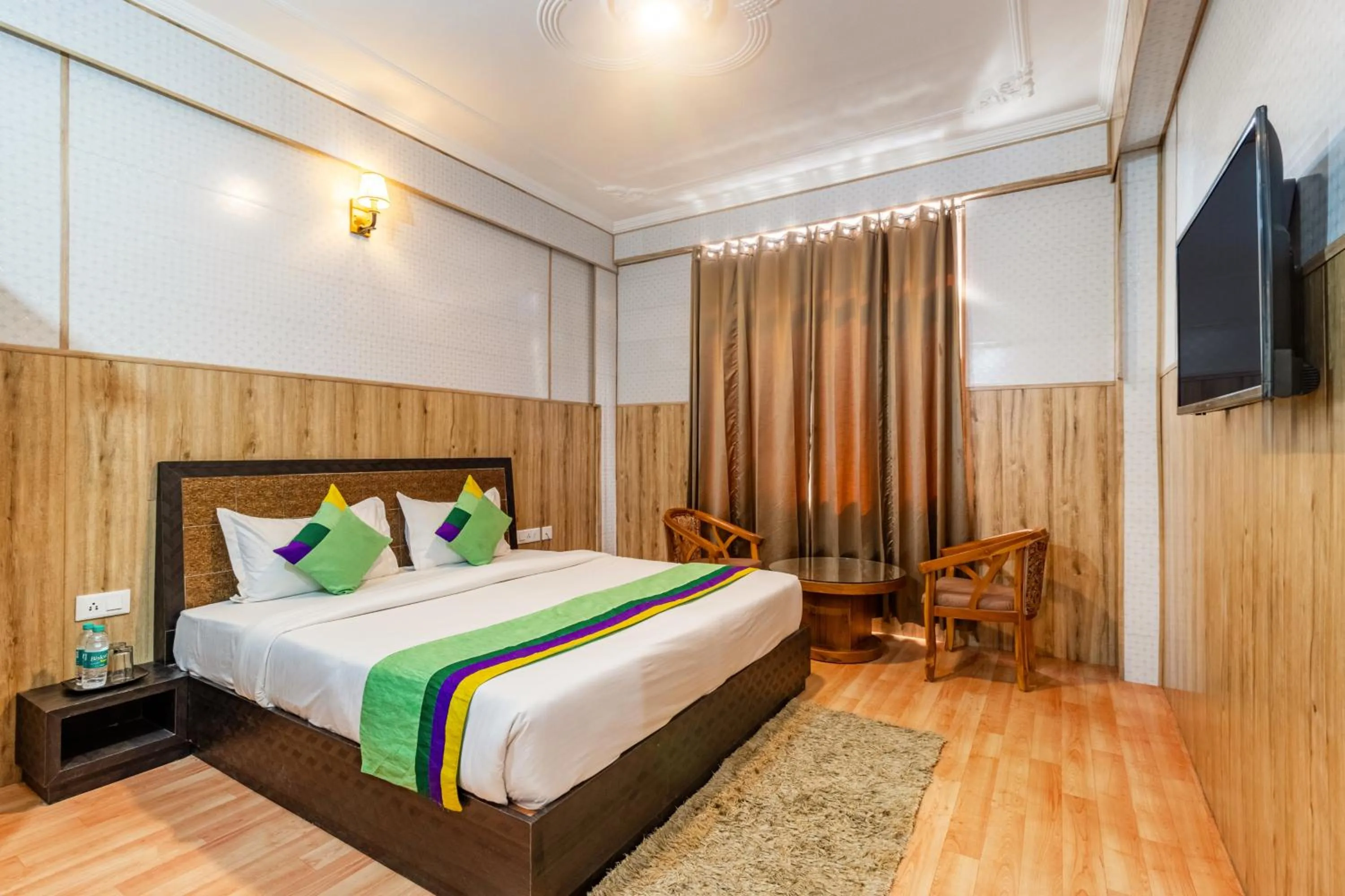 TV and multimedia in Treebo Srishti Vaikunth With Mountain View