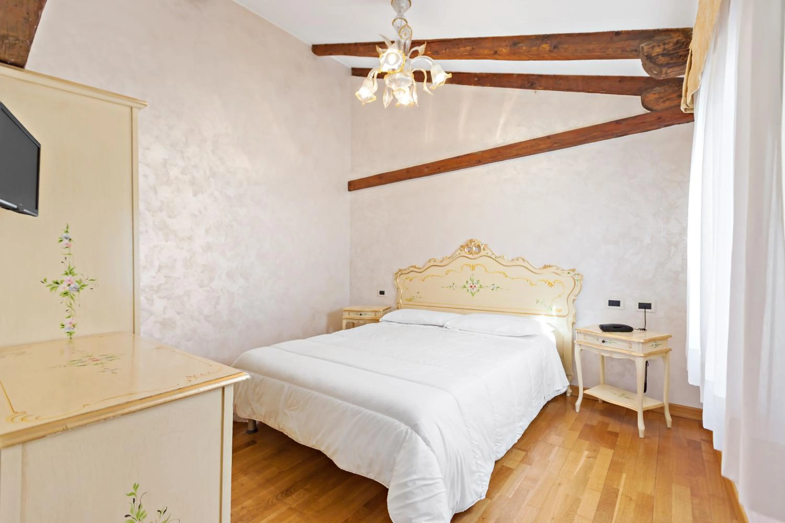 Bed in Hotel Malibran