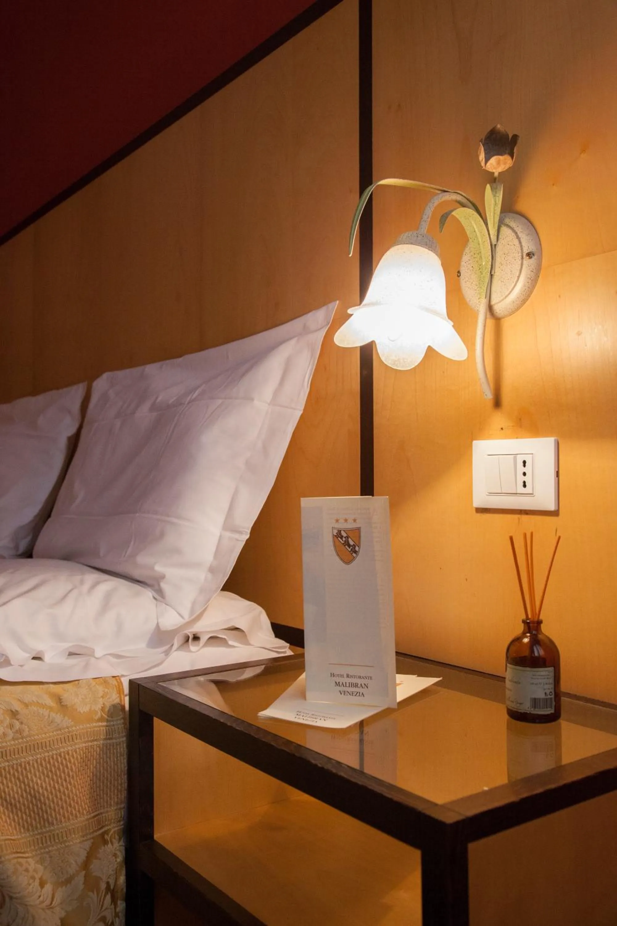 Bed in Hotel Malibran