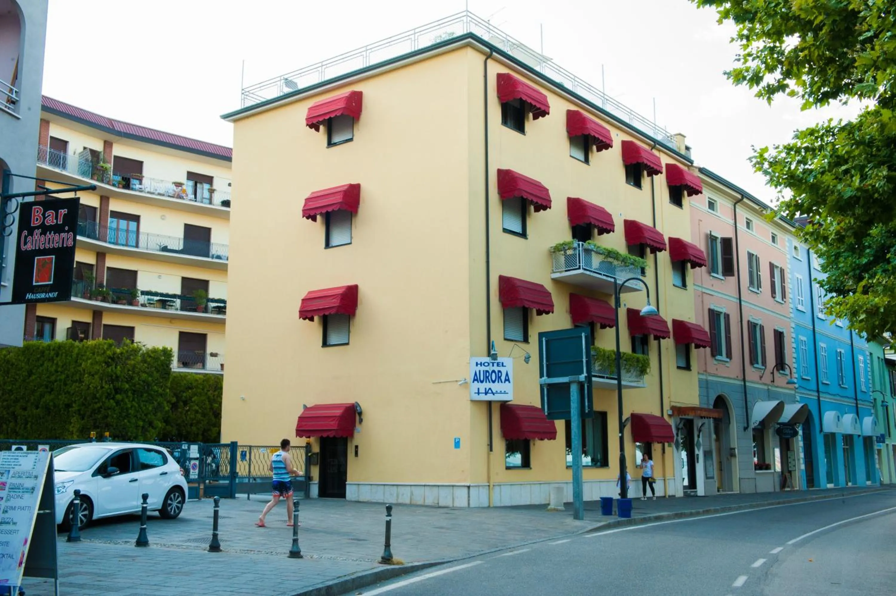 Property logo or sign in Hotel Aurora