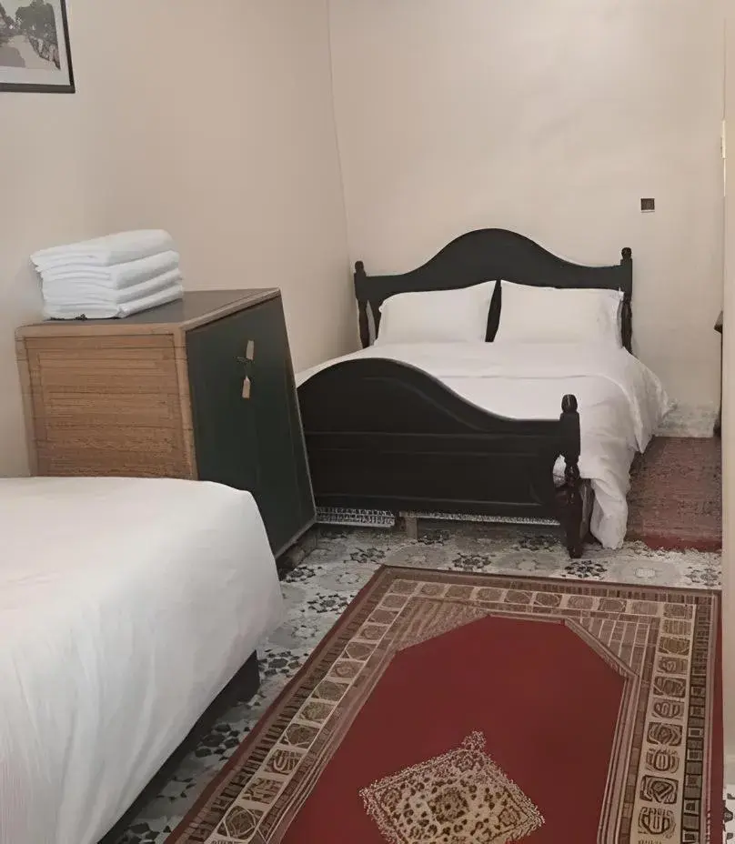 Classic Quadruple Room in Riad Carole - Perfect for Families & Groups Classic Quadruple Room in Riad Carole - Perfect for Families & Groups