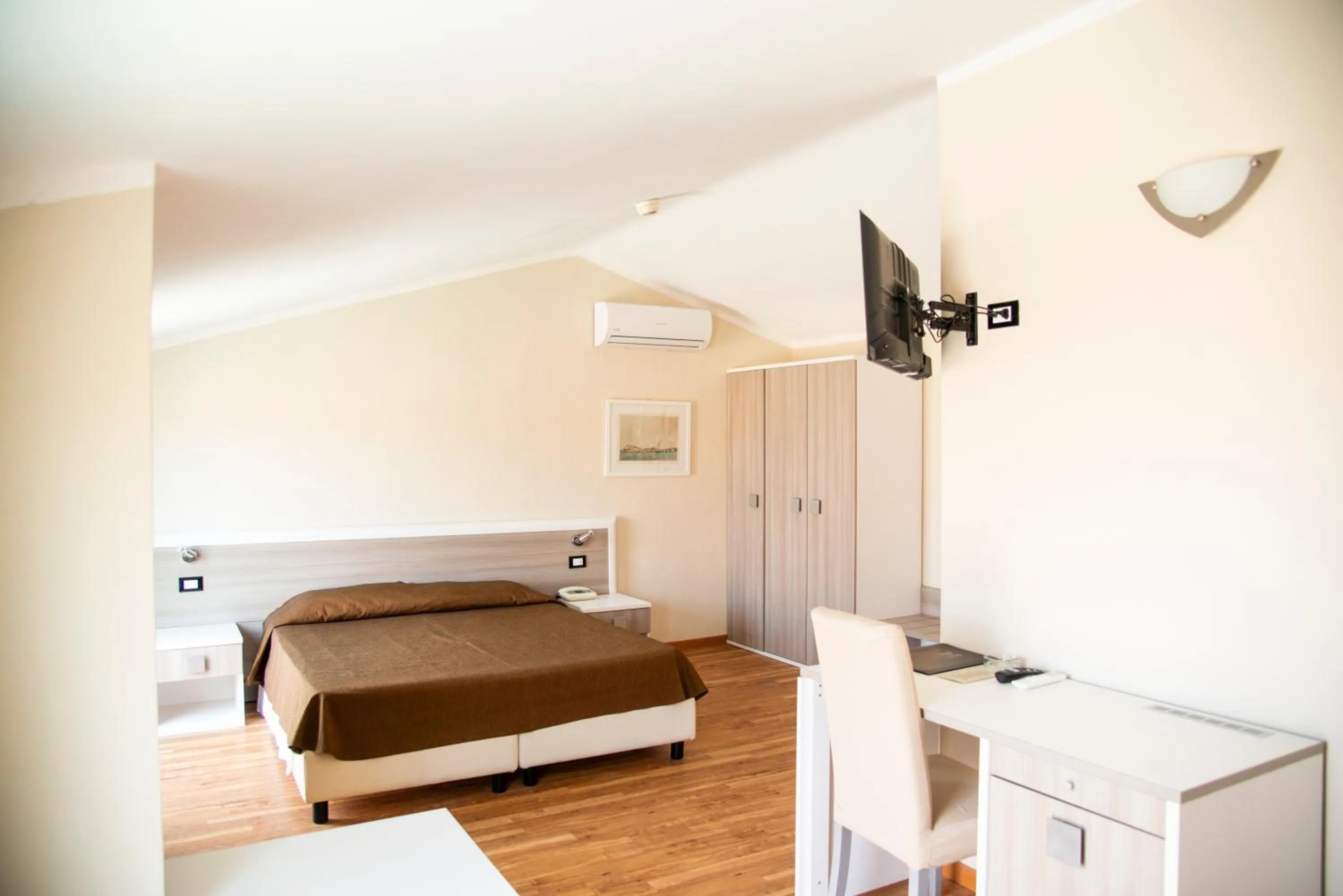 Bed in Hotel Fabricia