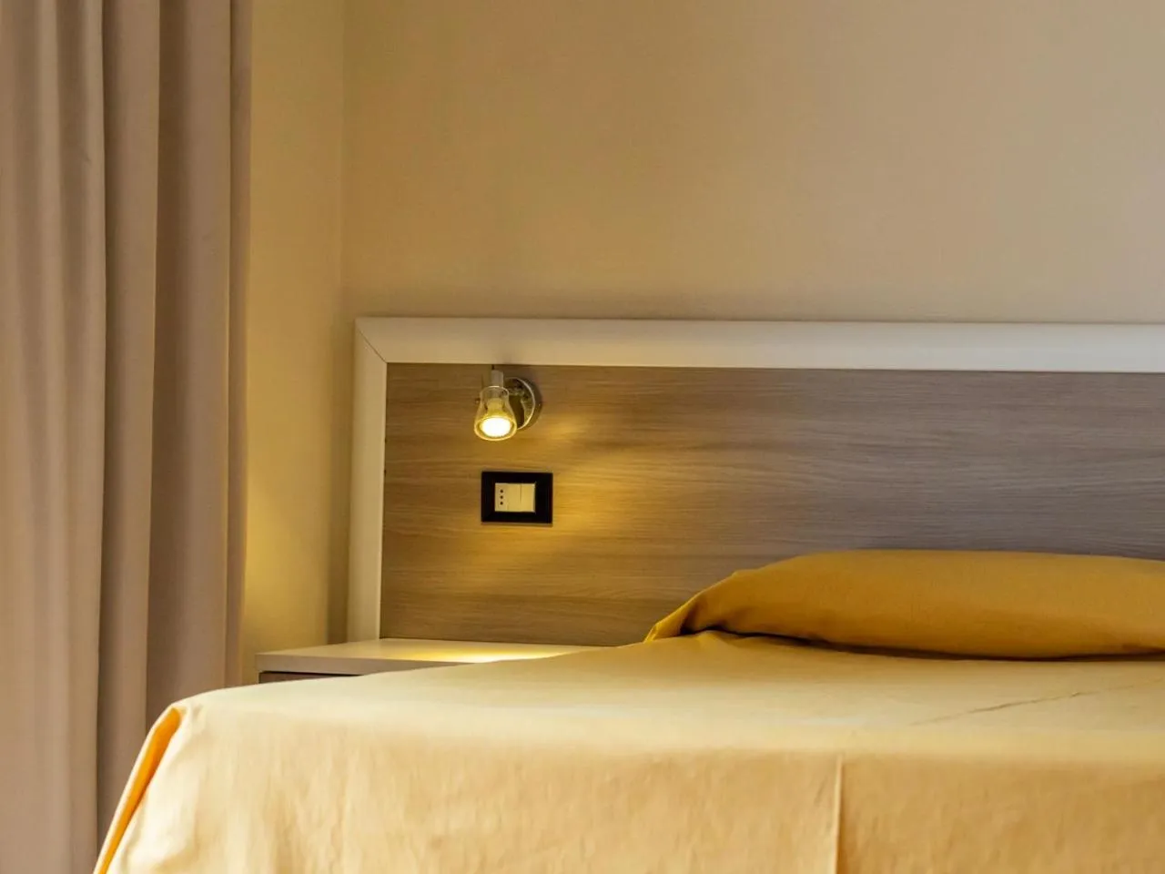 Bed in Hotel Fabricia