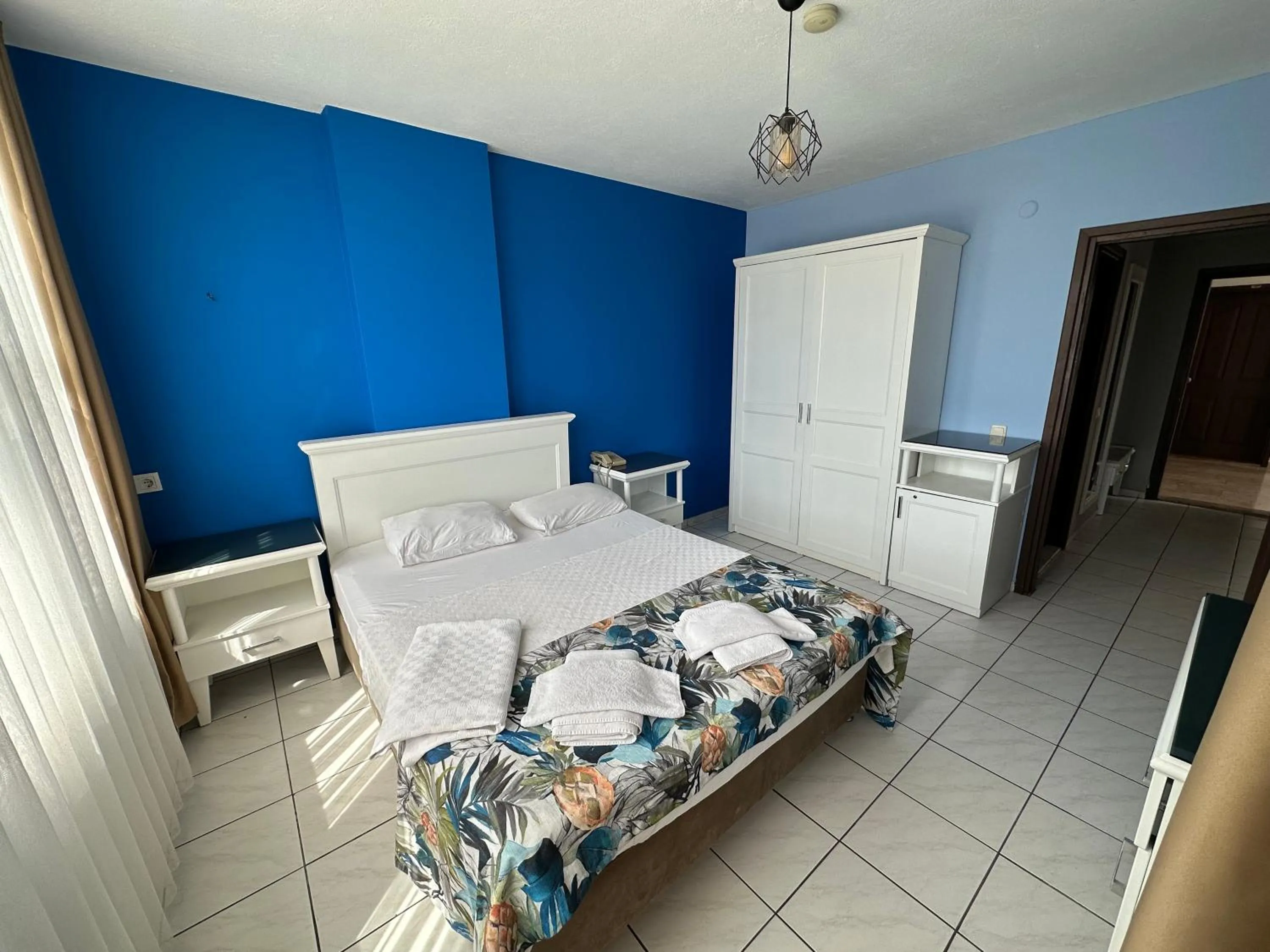 Bed in Maren City Apart Hotel