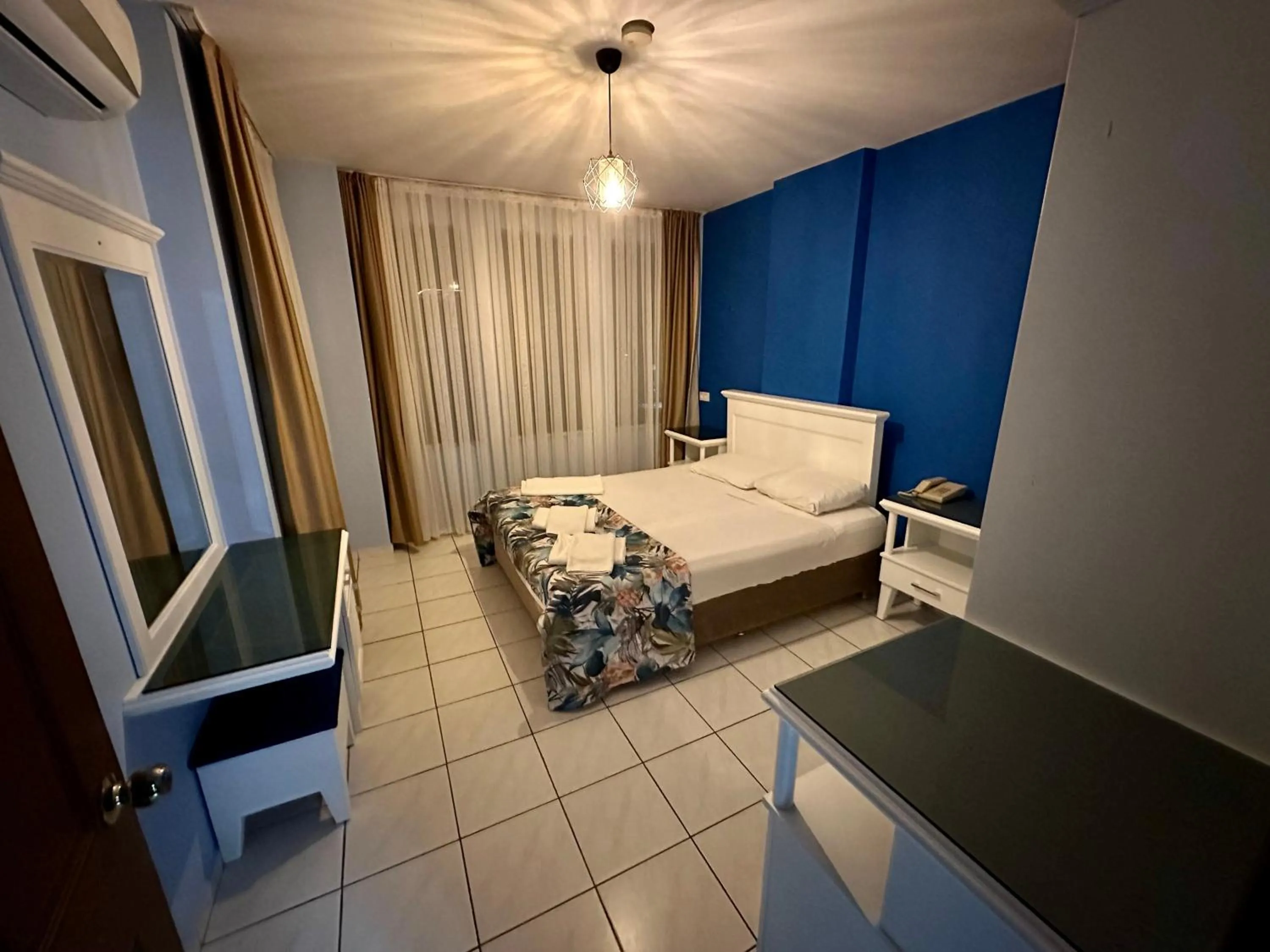 Bed in Maren City Apart Hotel