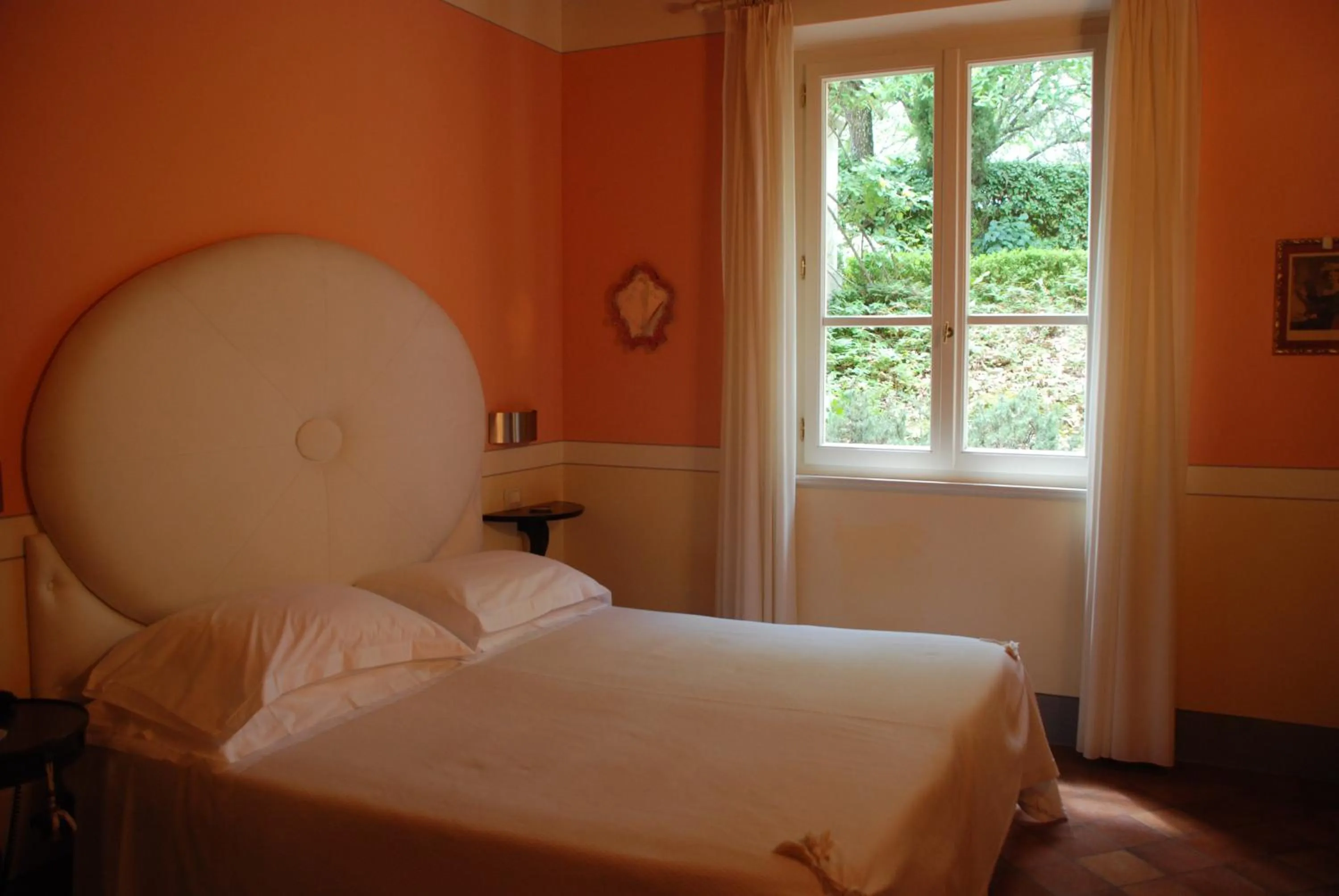 Bed in Il Rondò Boutique Hotel