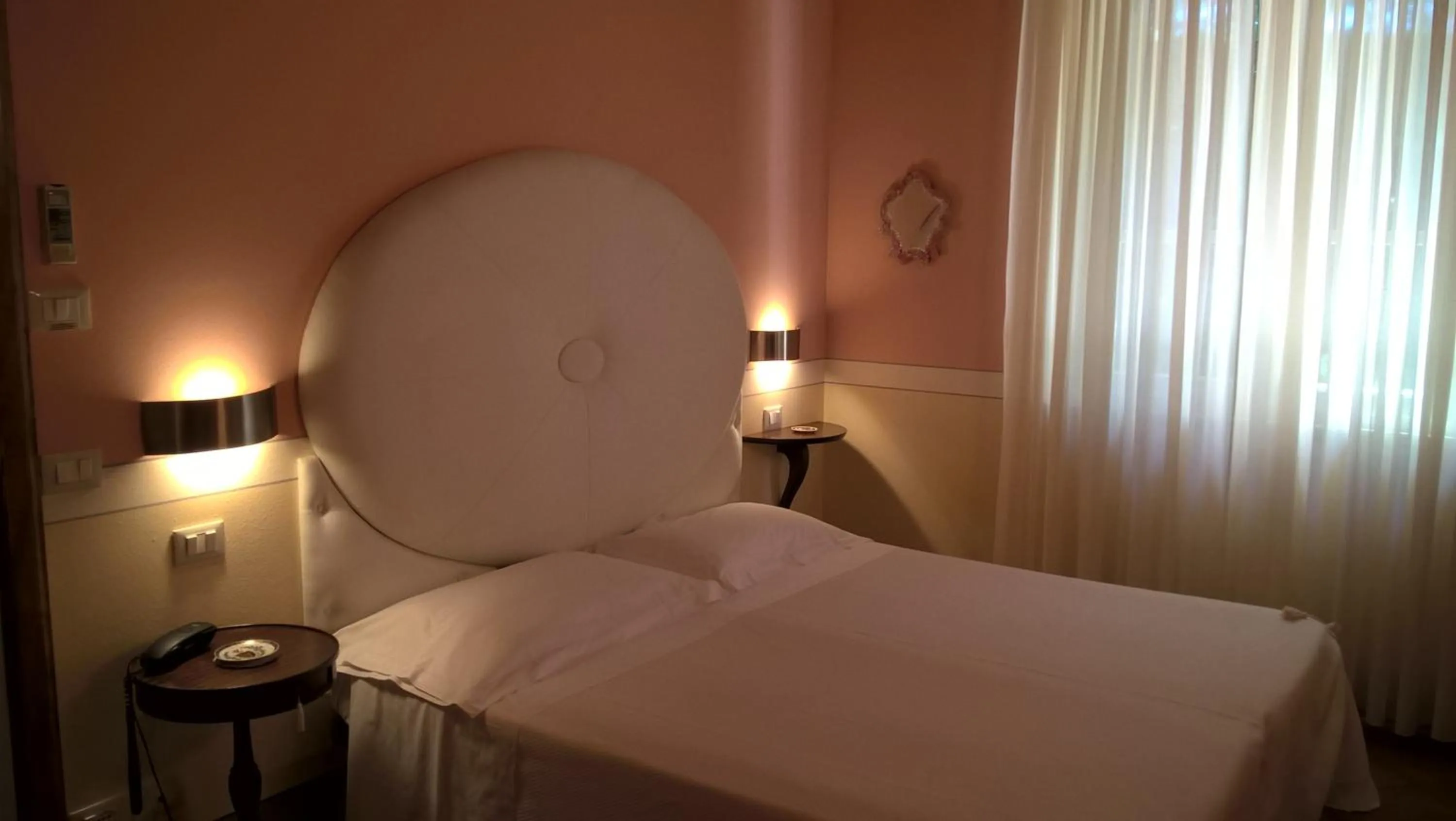 Bed in Il Rondò Boutique Hotel