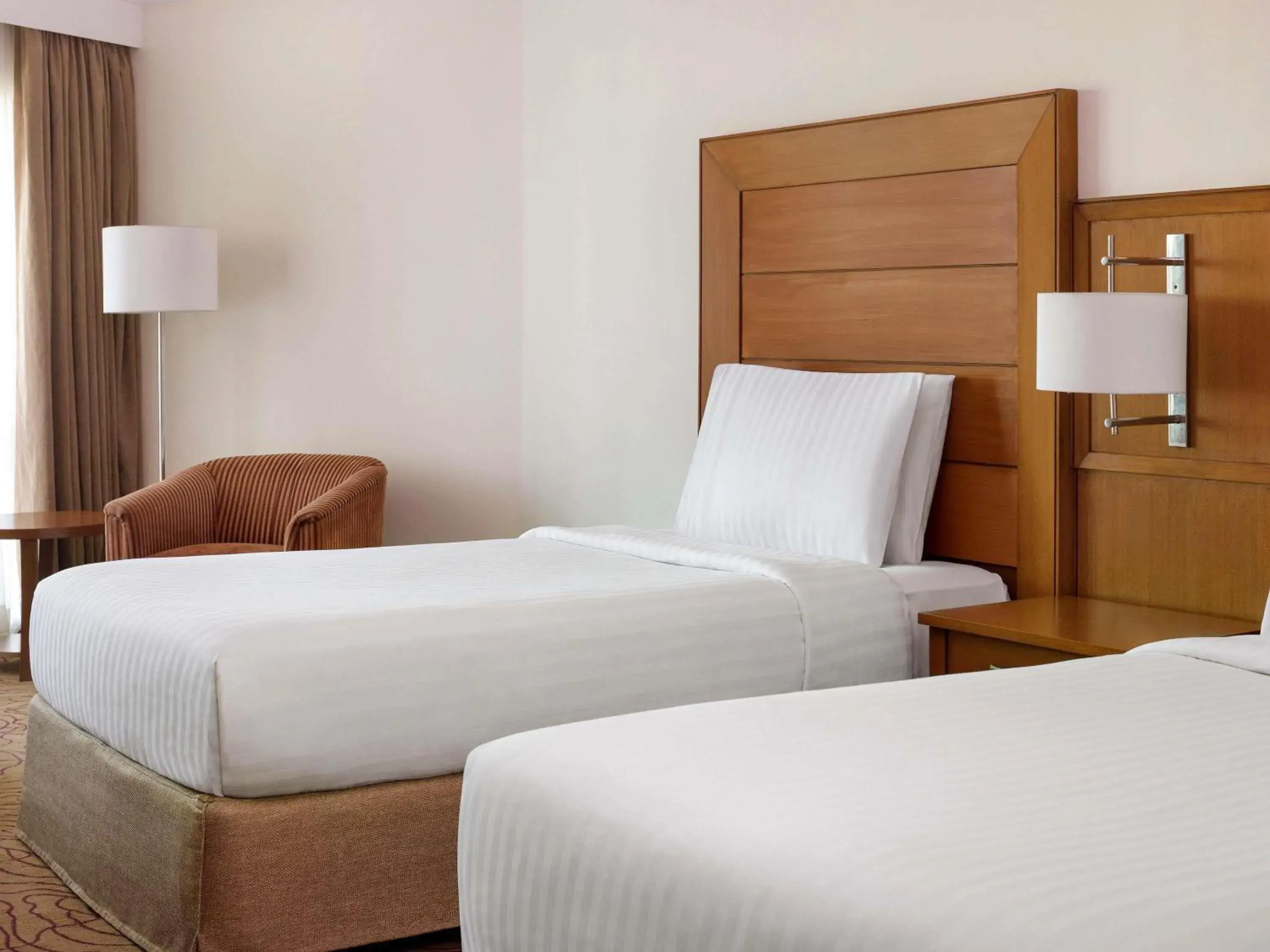 Deluxe Twin Room in Mövenpick Hotel Karachi Deluxe Twin Room in Mövenpick Hotel Karachi