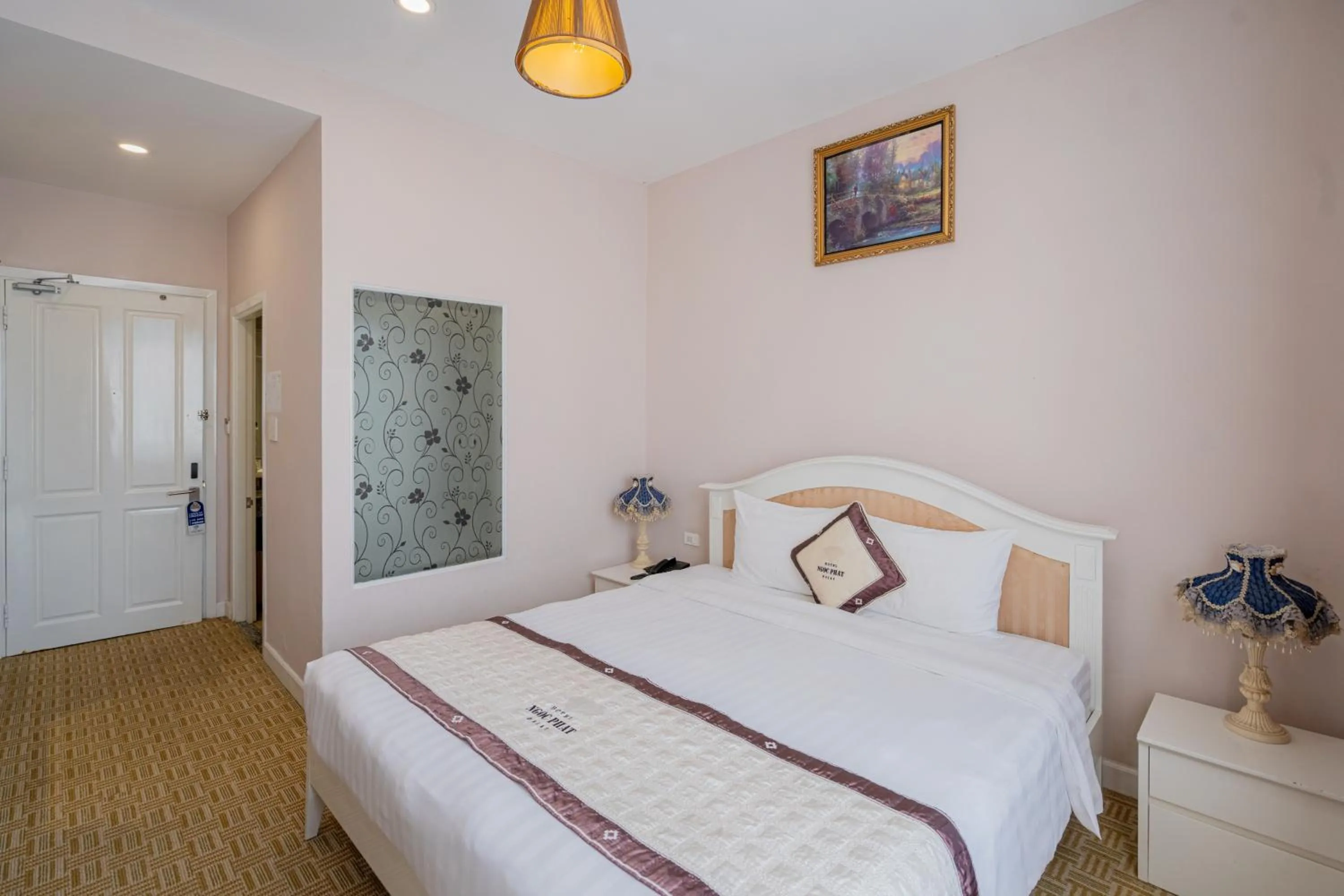 Bed in Ngoc Phat Dalat Hotel