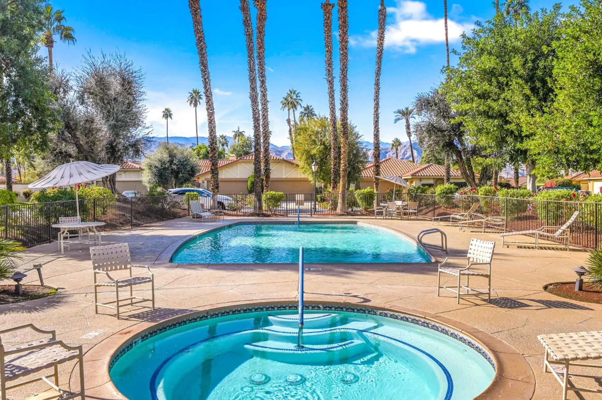Swimming pool in Spectacular condo with private golf privileges includes golf cart on Monterey Country Club !!
