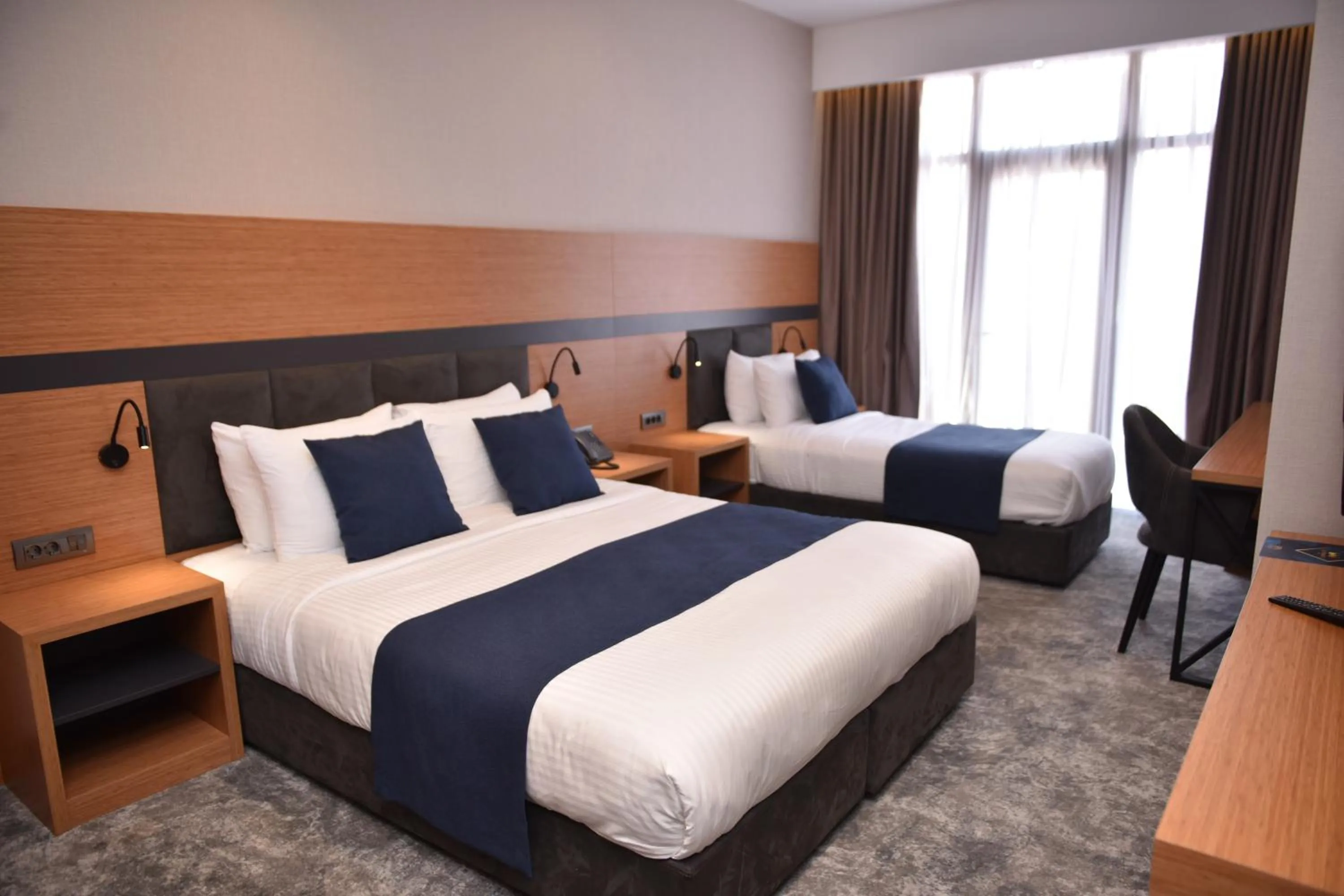 Bed in Hotel Monarch