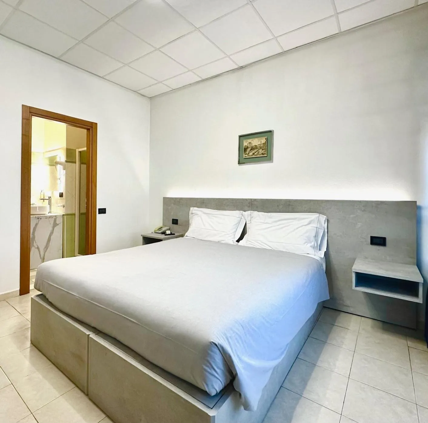 Bed in Hotel Leonardo