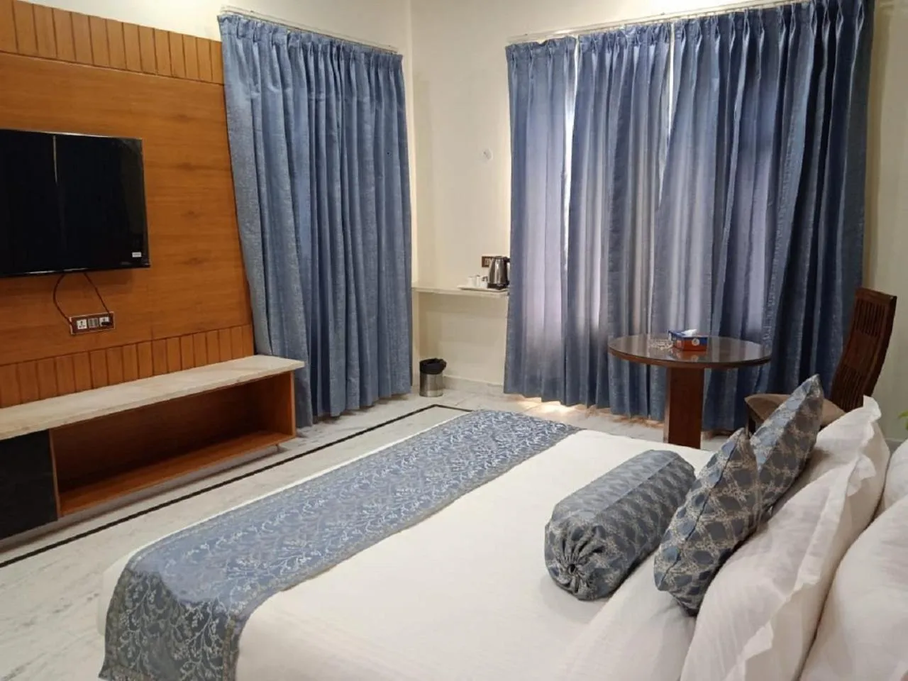 Bedroom in Matoshree Club and Resort