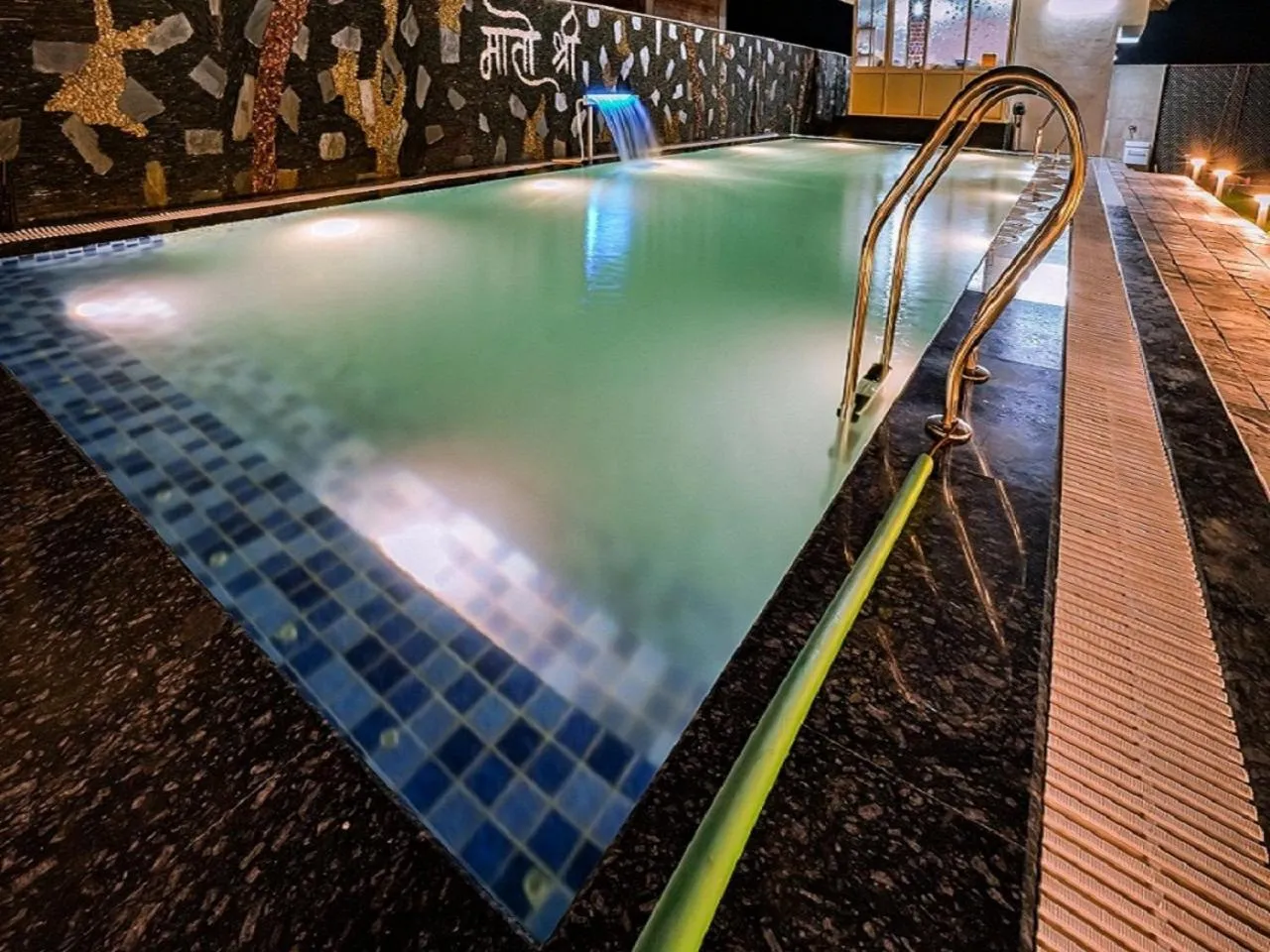 Swimming pool in Matoshree Club and Resort