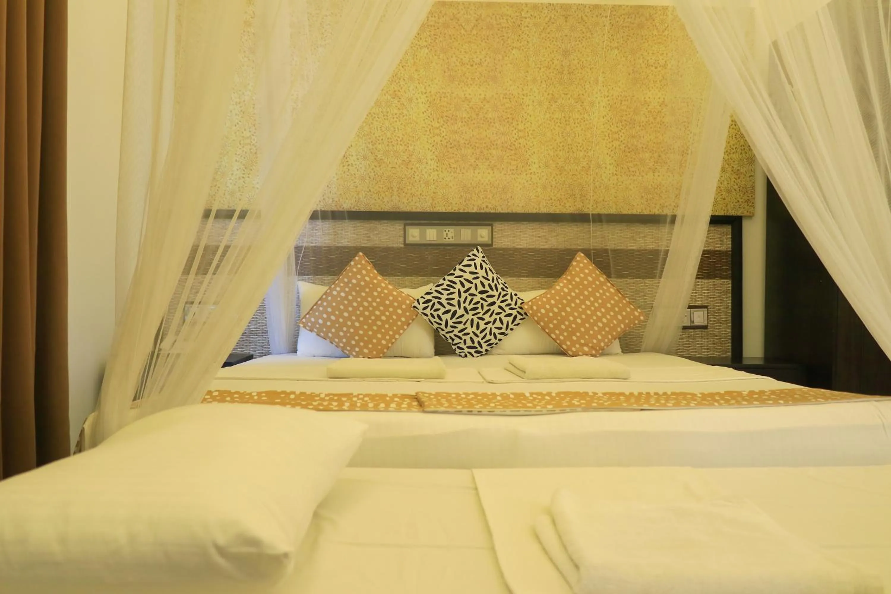 Bed in Thissa Inn Hotel