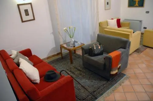 Communal lounge/ TV room in Caravaggio Hotel