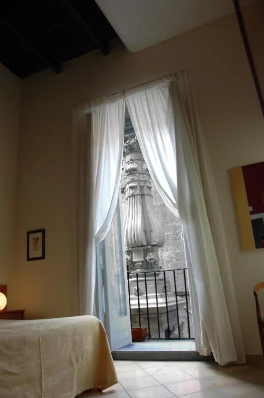 View (from property/room), Bed in Caravaggio Hotel