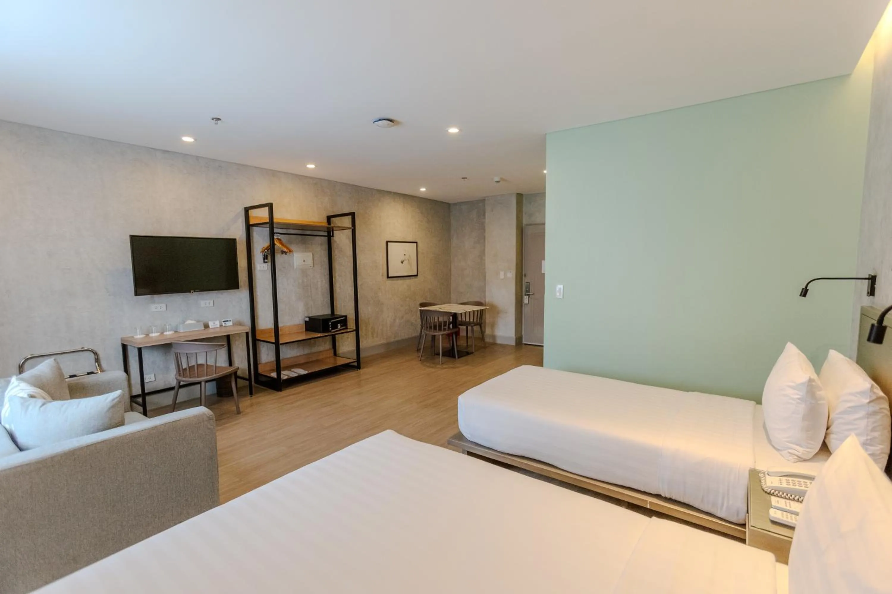 Photo of the whole room, Bed in Primeway Suites Cebu