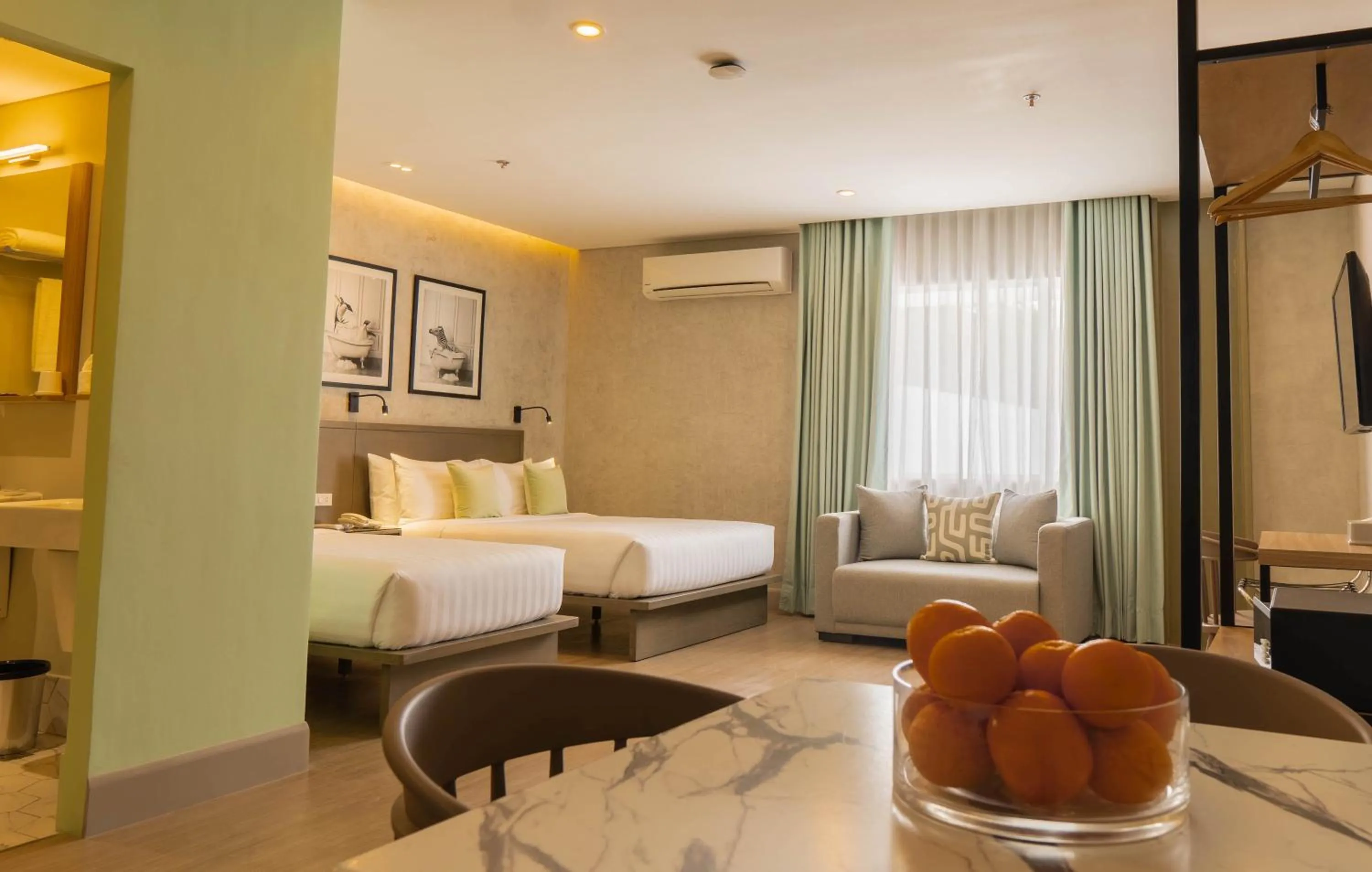 Photo of the whole room, Bed in Primeway Suites Cebu