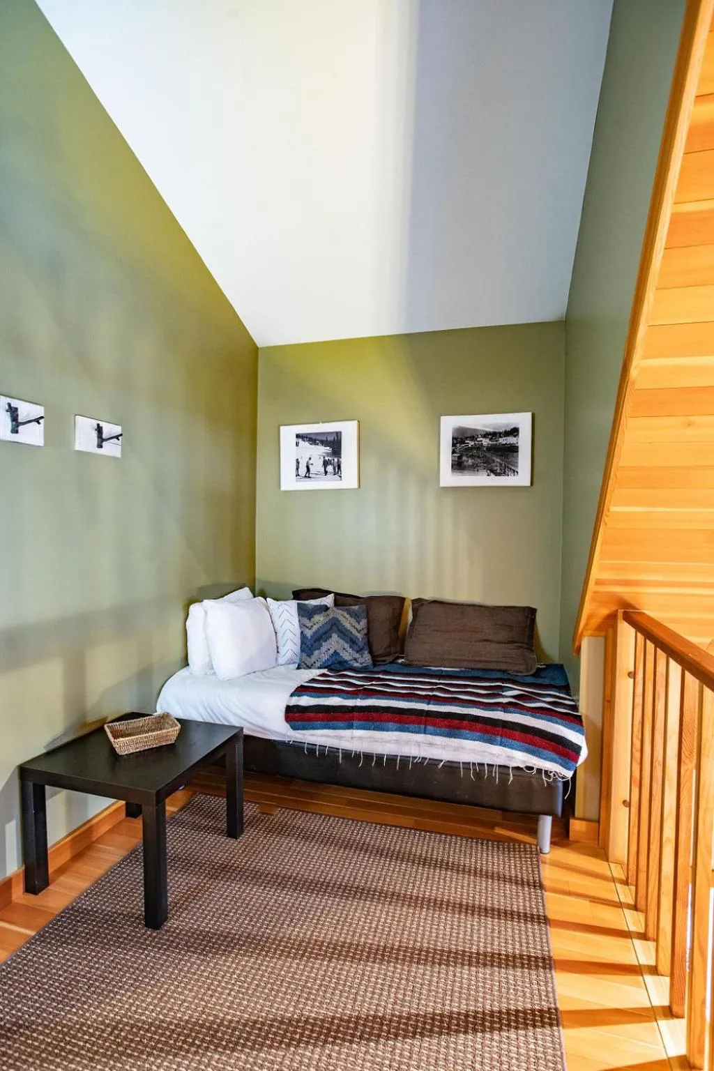 Seating area, Bed in Stoke Cabin by Revelstoke Vacations