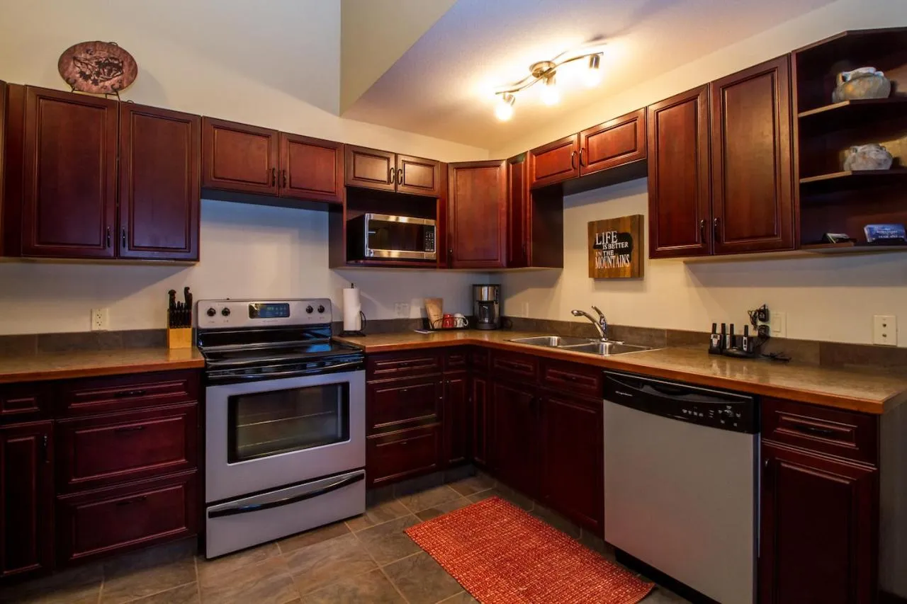 Kitchen or kitchenette in Give Something Back Retreat by Revelstoke Vacations