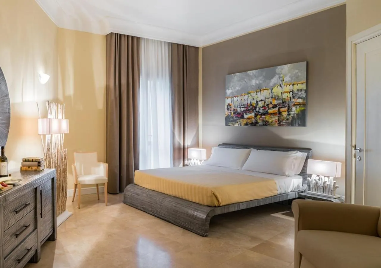 Bed in Tombolo Talasso Resort