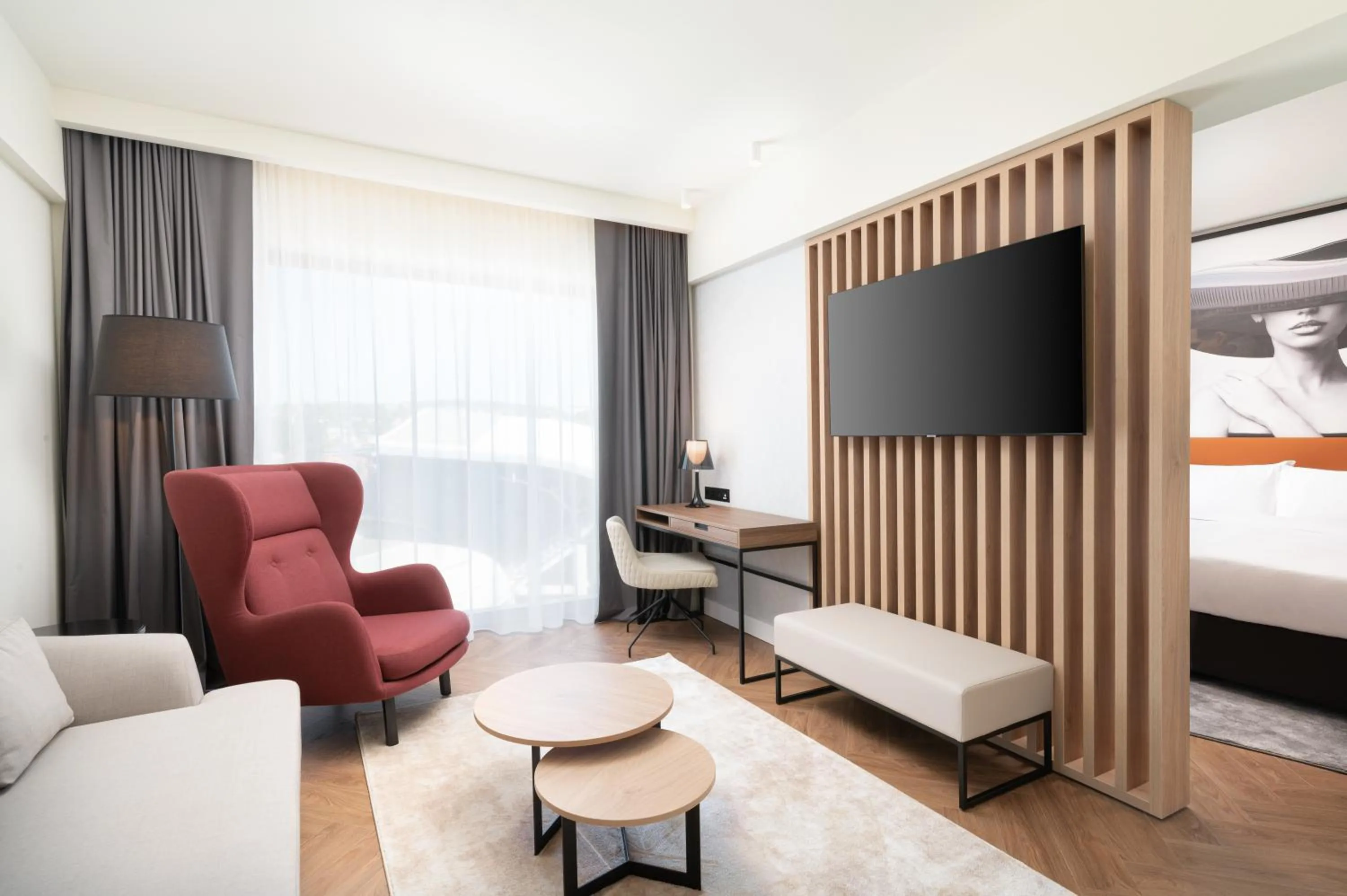 Seating area, Bed in Radisson Blu Hotel, Cluj