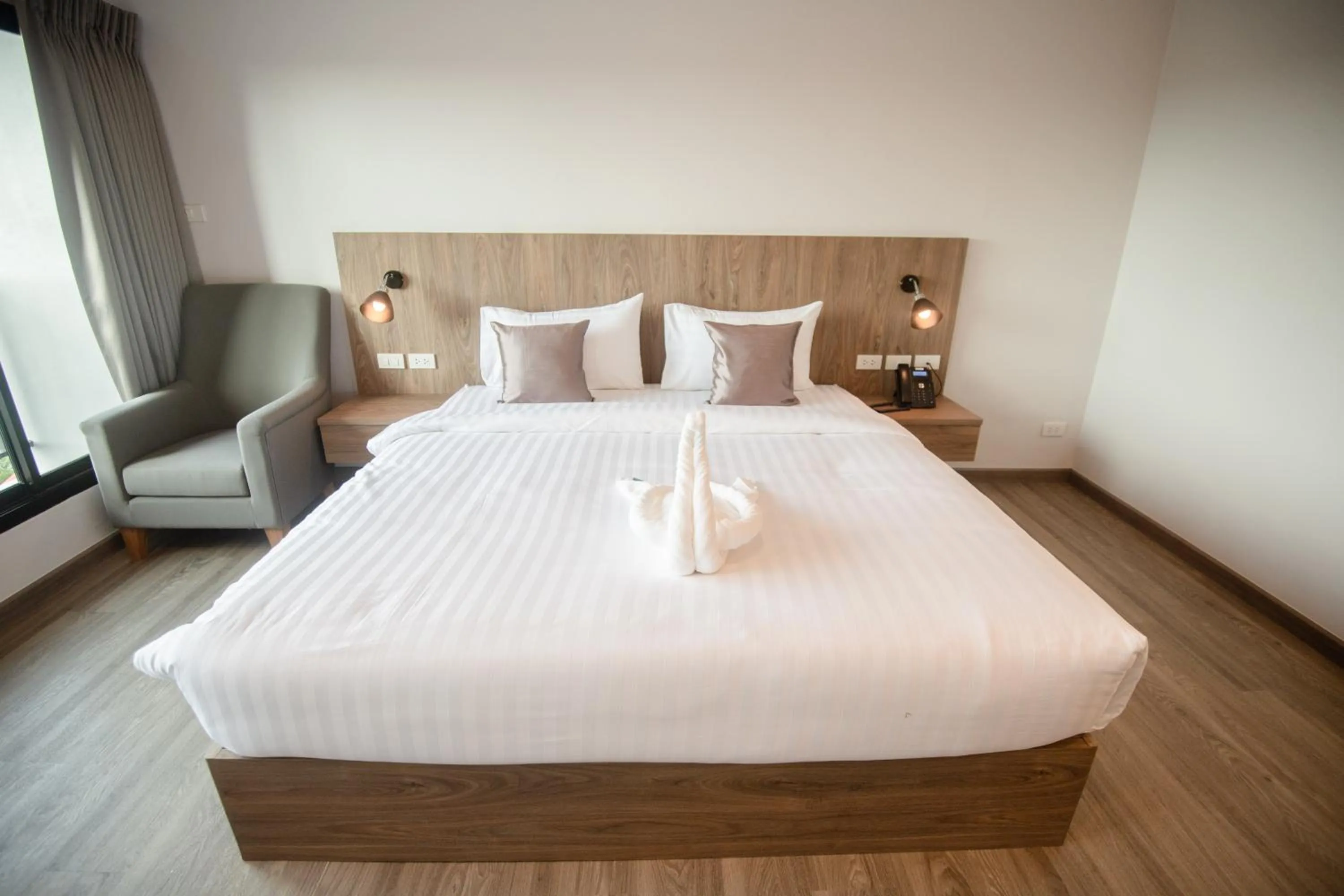 Bed in Nakara Hotel, Ubon Ratchathani