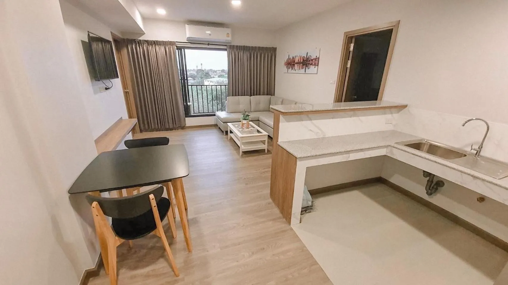 Kitchen or kitchenette in Nakara Hotel, Ubon Ratchathani