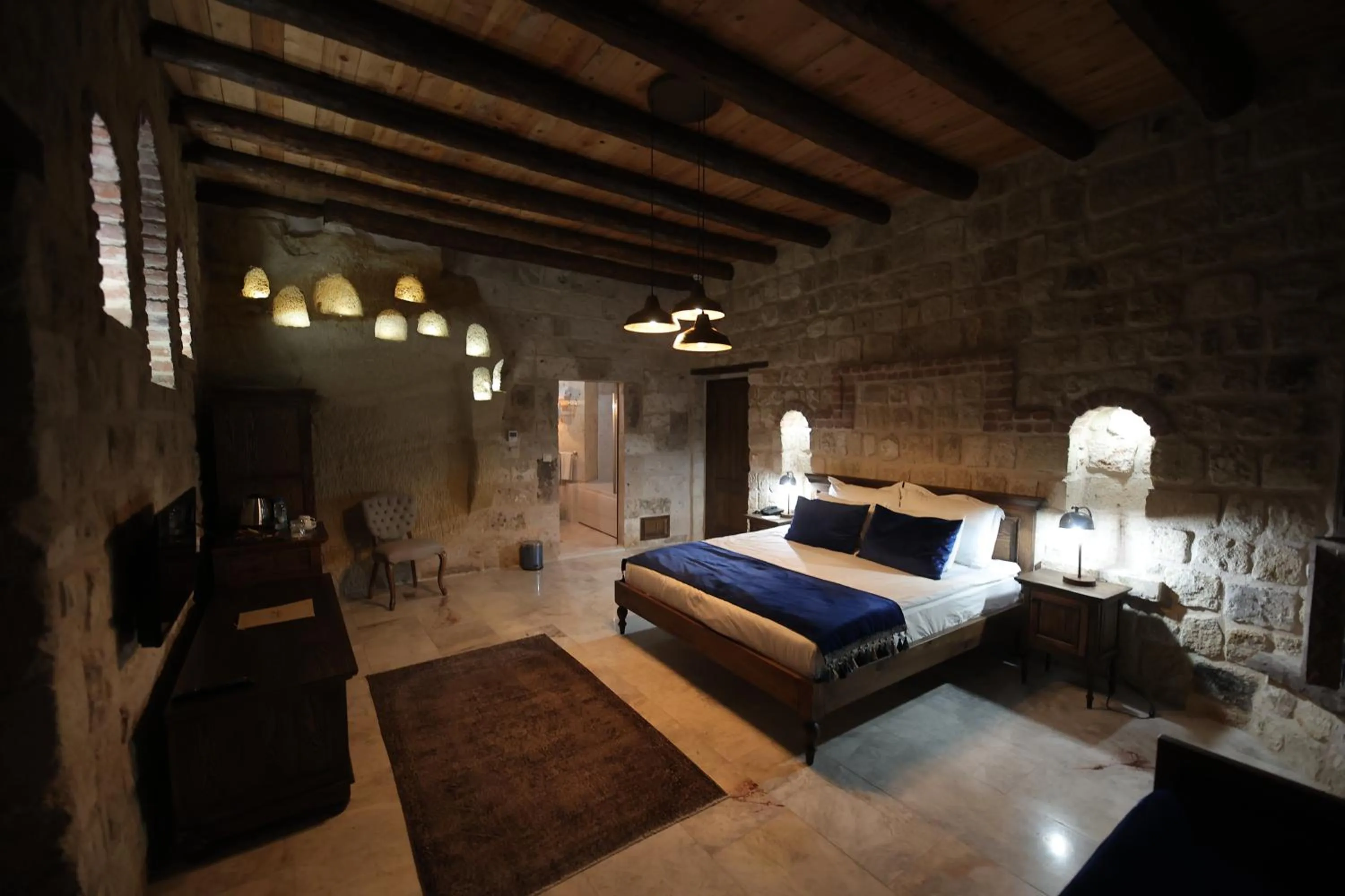 Bed in Ürgüp Cave Suites