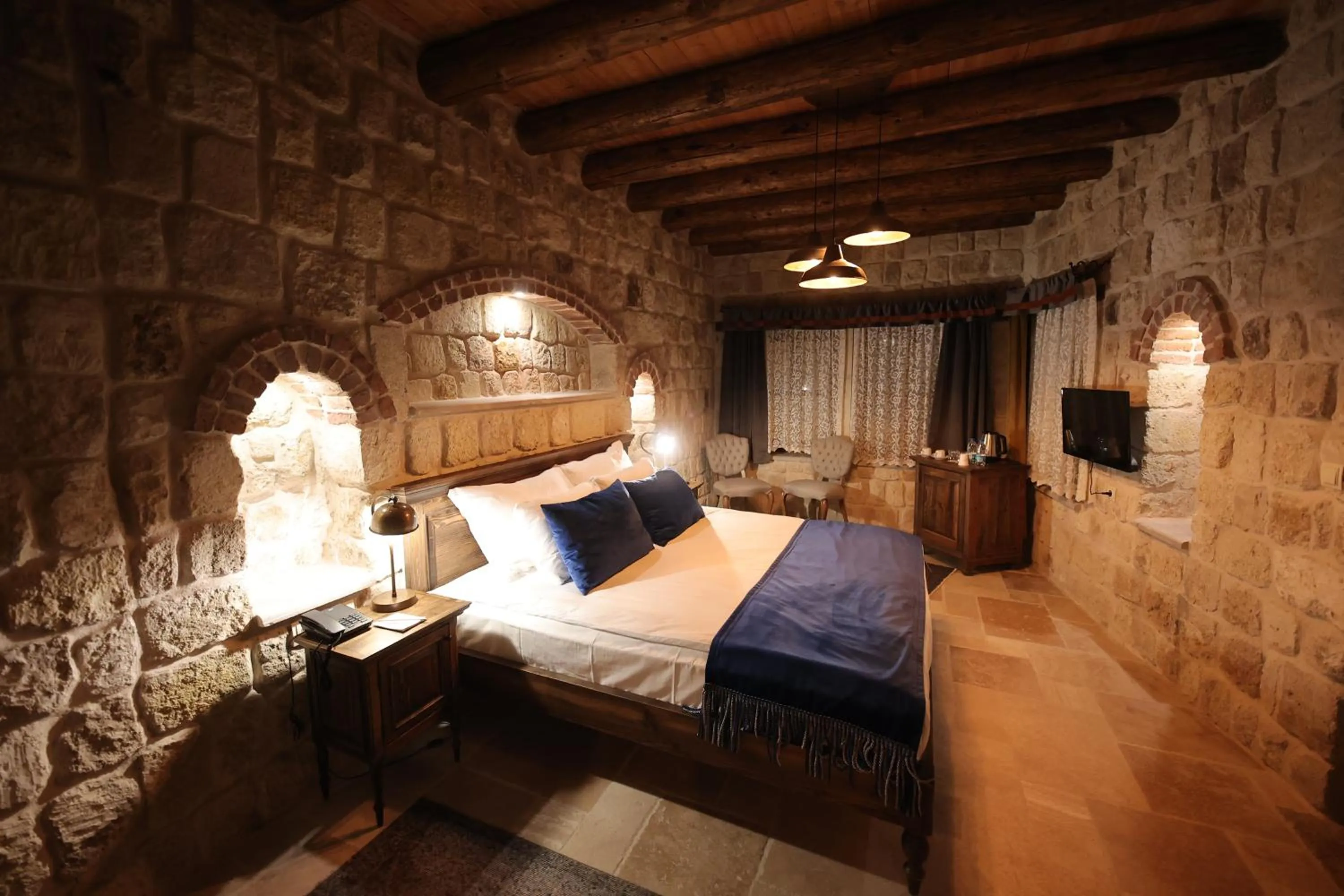 Bed in Ürgüp Cave Suites