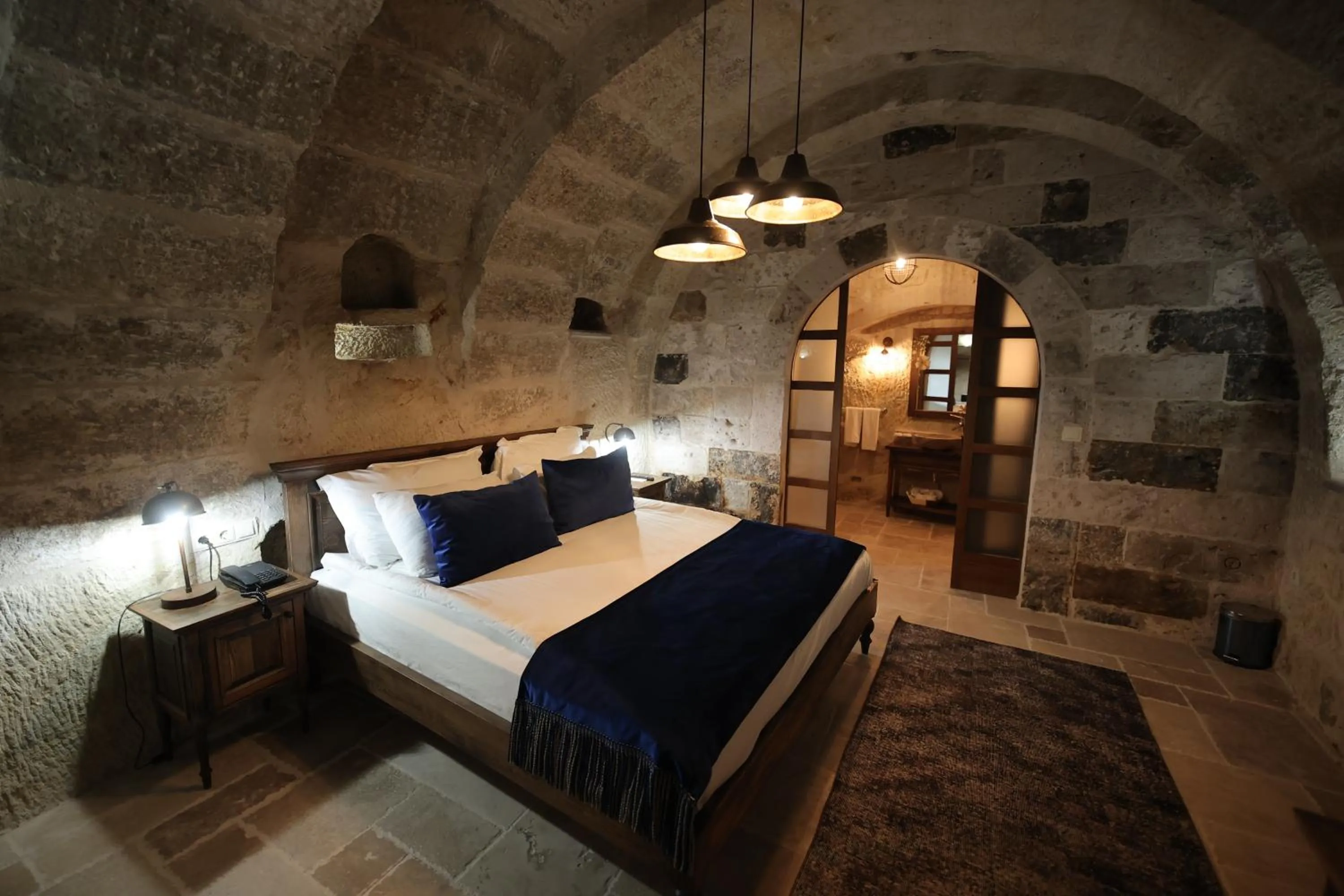 Bed in Ürgüp Cave Suites