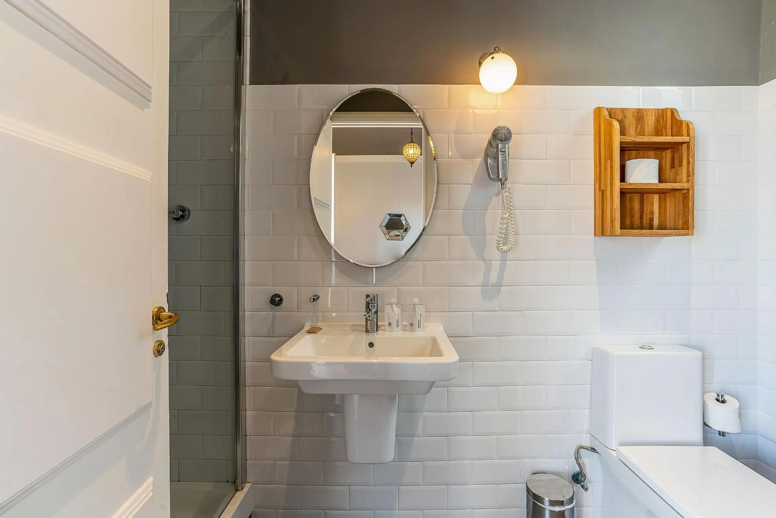 Toilet in Casa Gracia Apartments