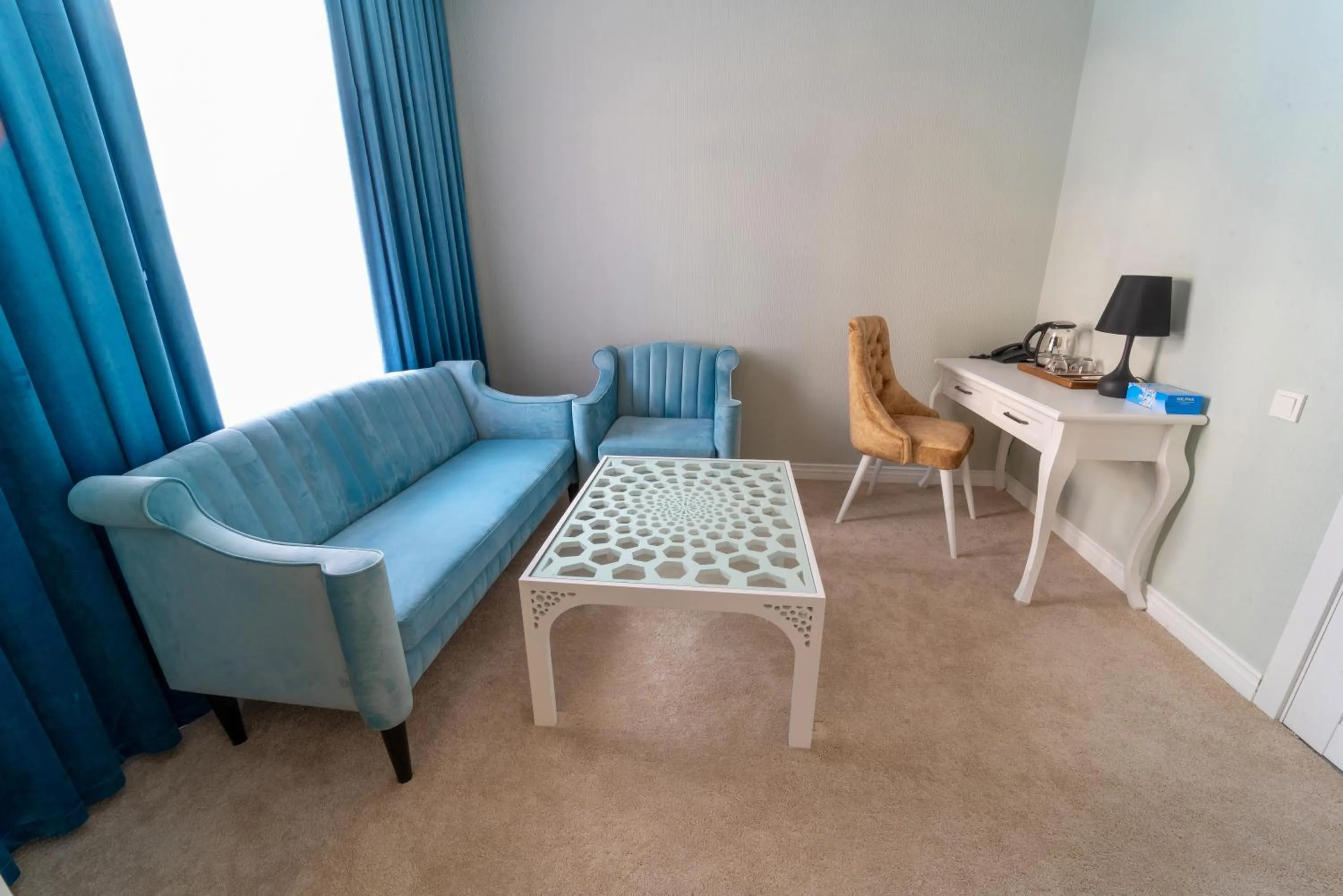 Living room in Shohjahon Palace Hotel & Spa