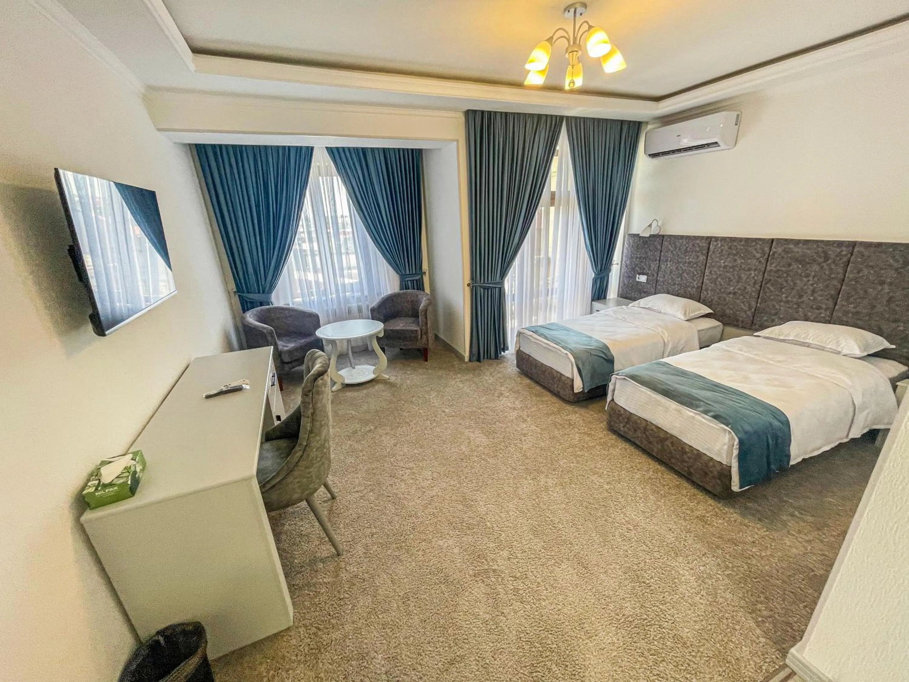 Bed in Shohjahon Palace Hotel & Spa