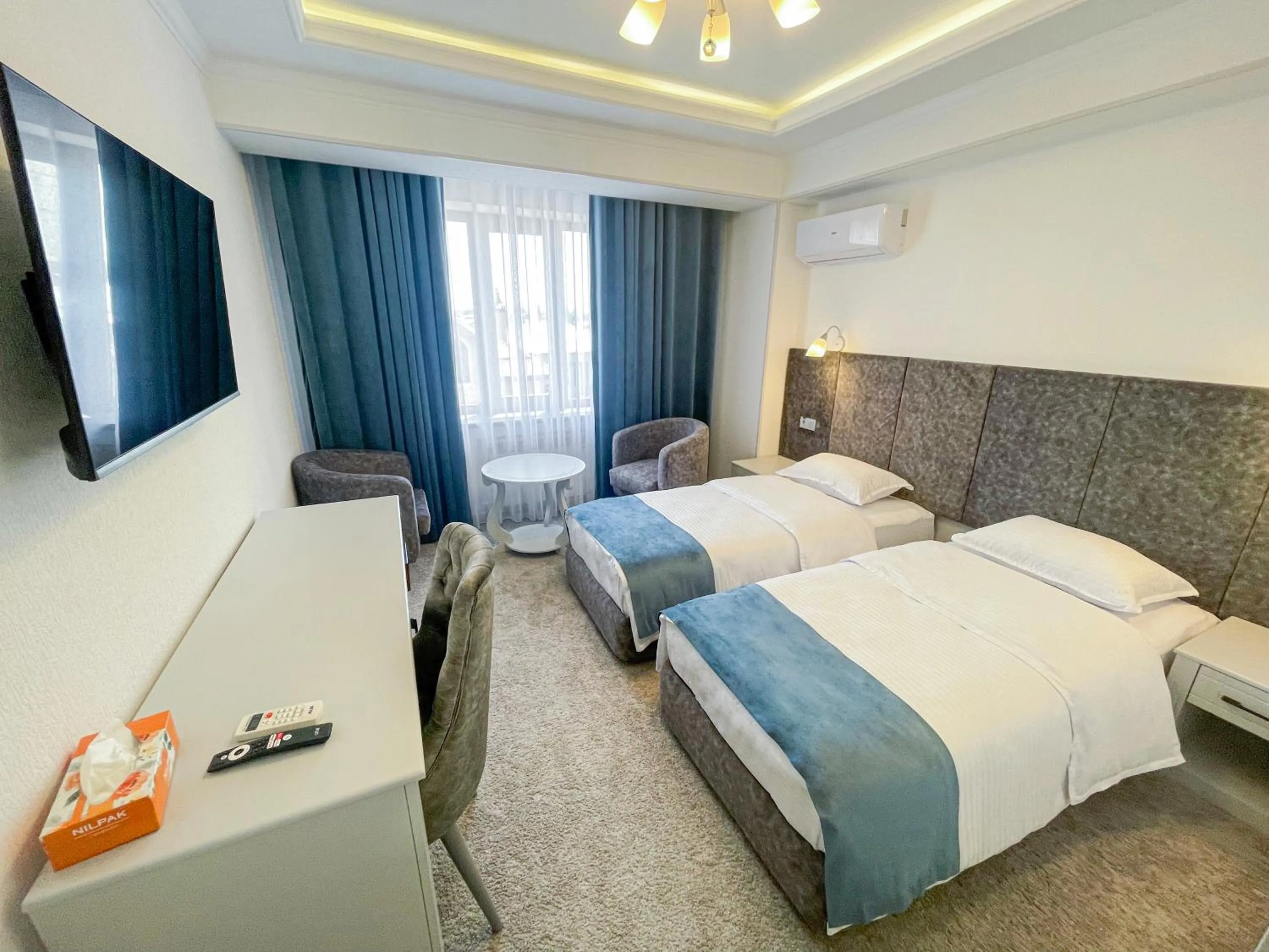 Bed in Shohjahon Palace Hotel & Spa