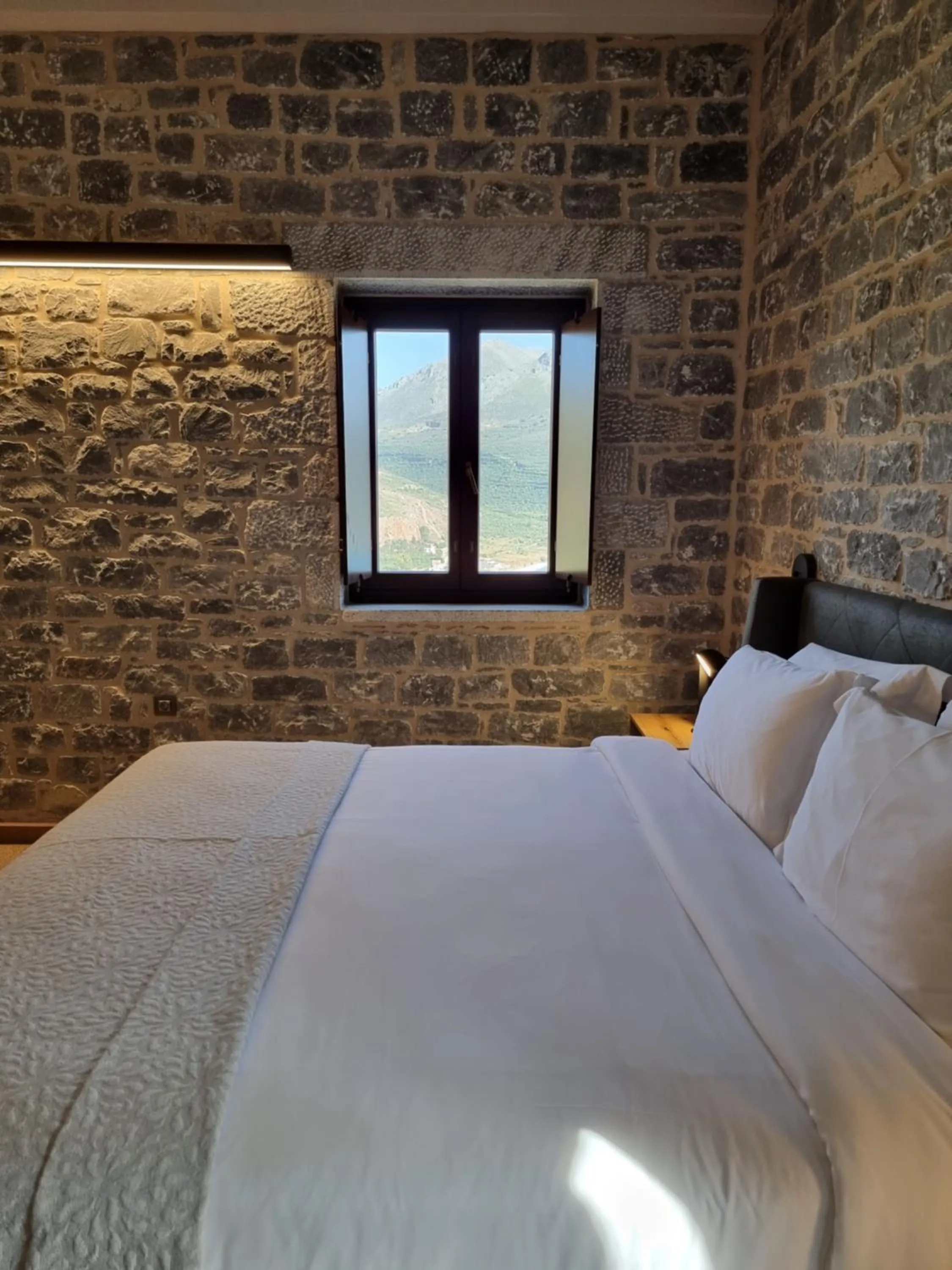 Bed in Manifest Boutique Hotel