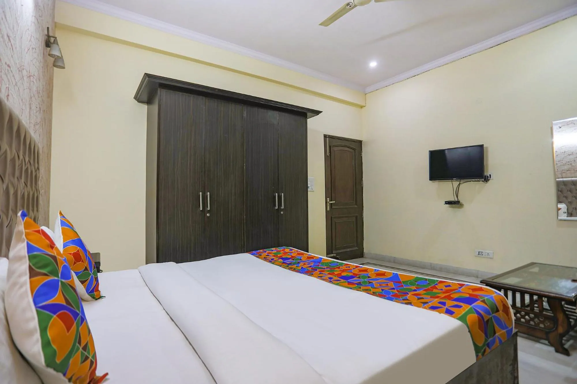 Bed in FabHotel HM Palace