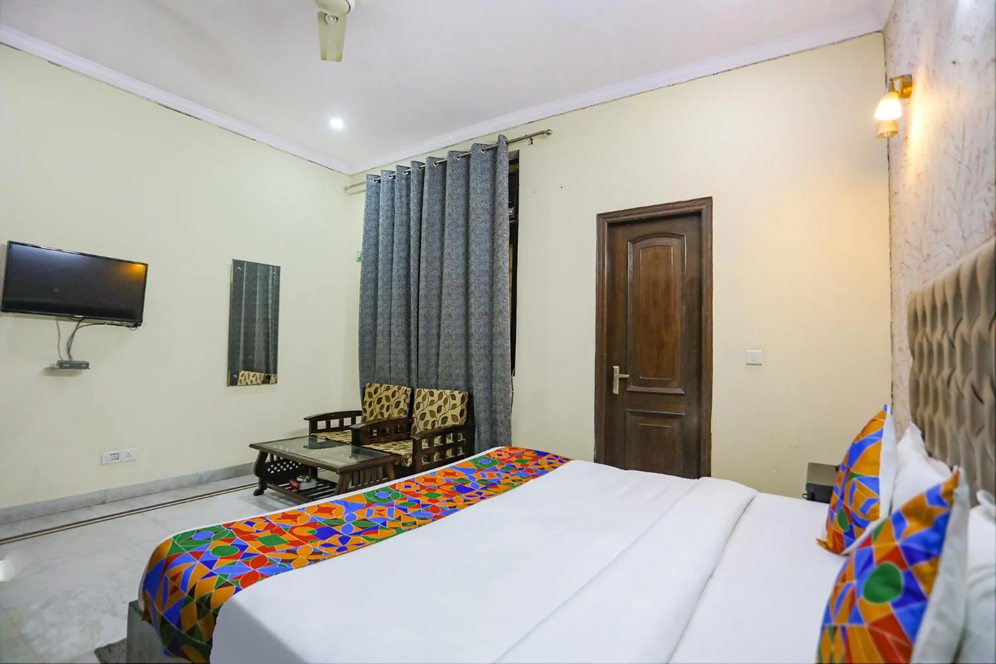 Bed in FabHotel HM Palace