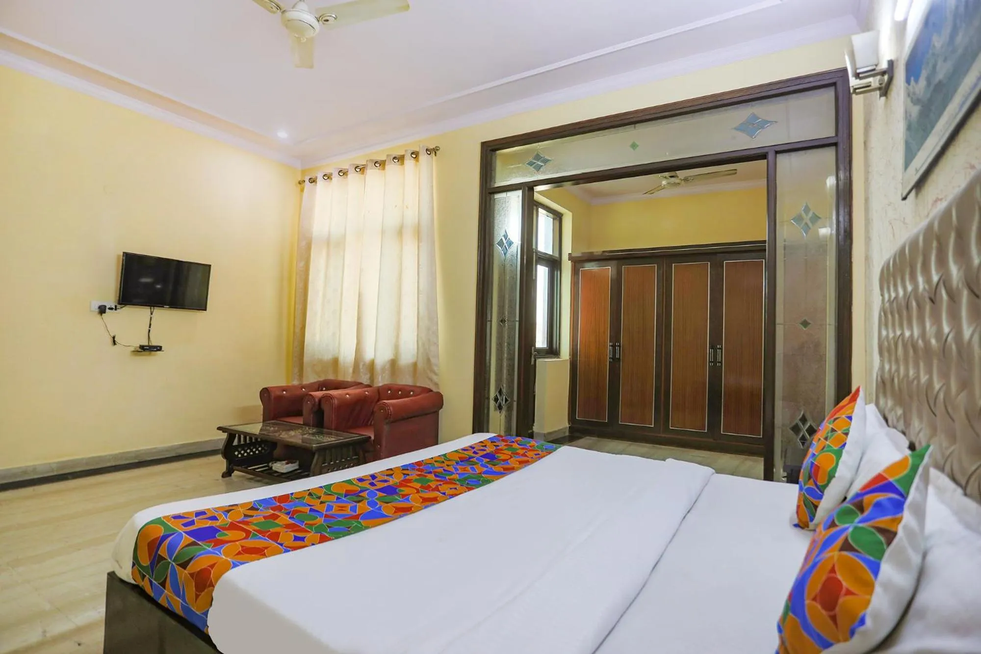 Bed in FabHotel HM Palace