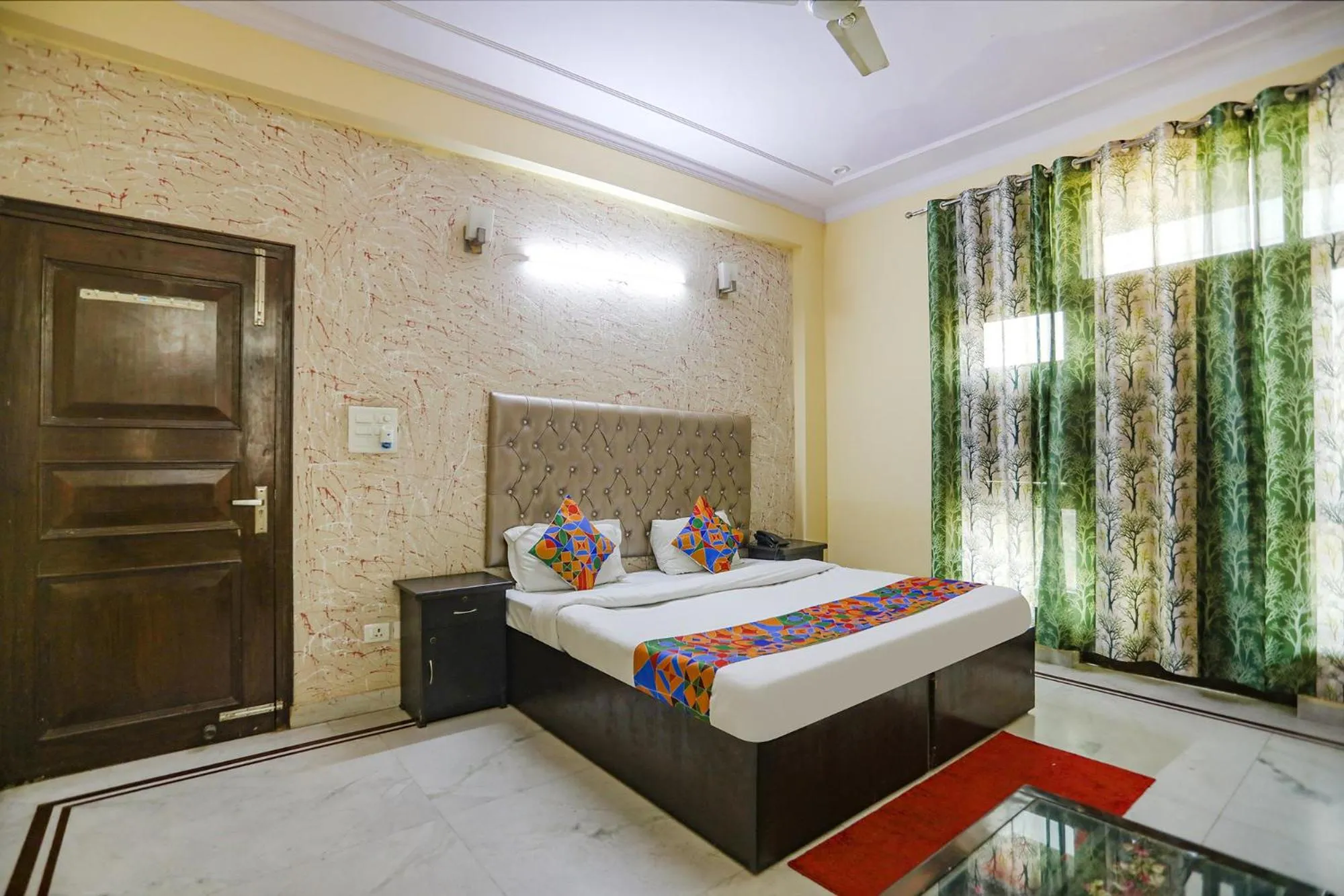 Bed in FabHotel HM Palace