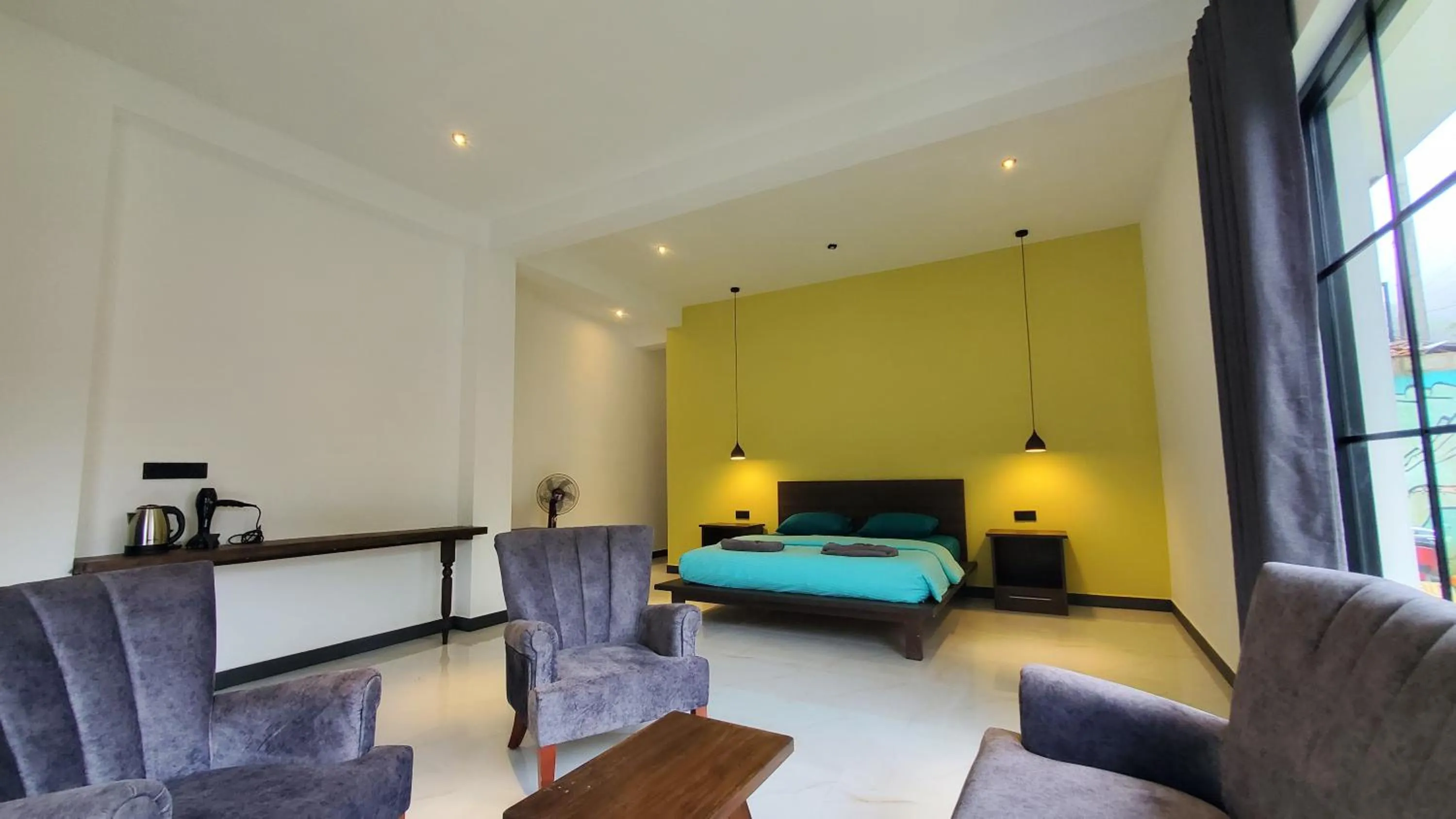 Bed in Ella Inn Hotel