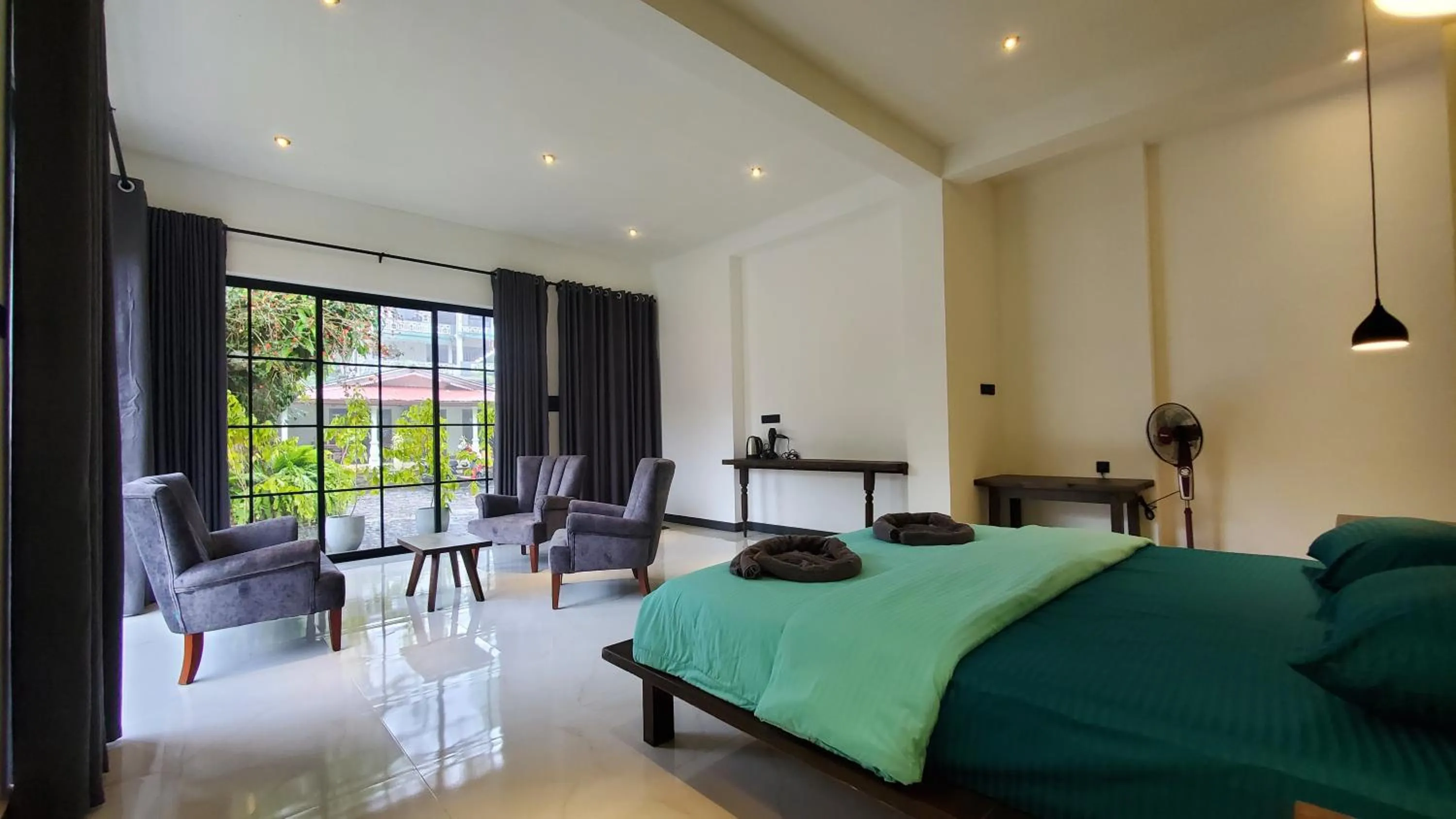 Bed in Ella Inn Hotel